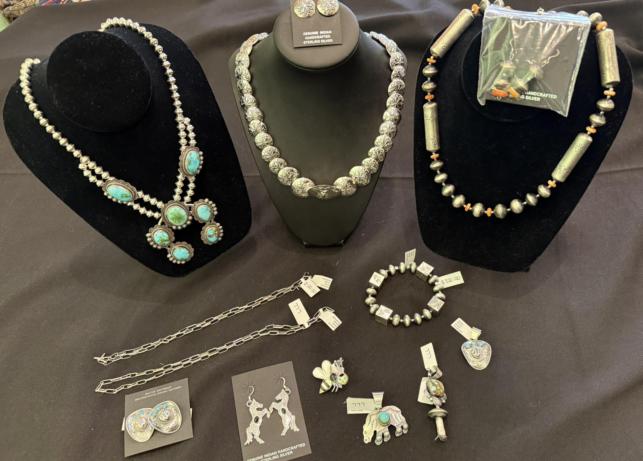 Traditional Navajo silver and stone art by Bo Reeves.