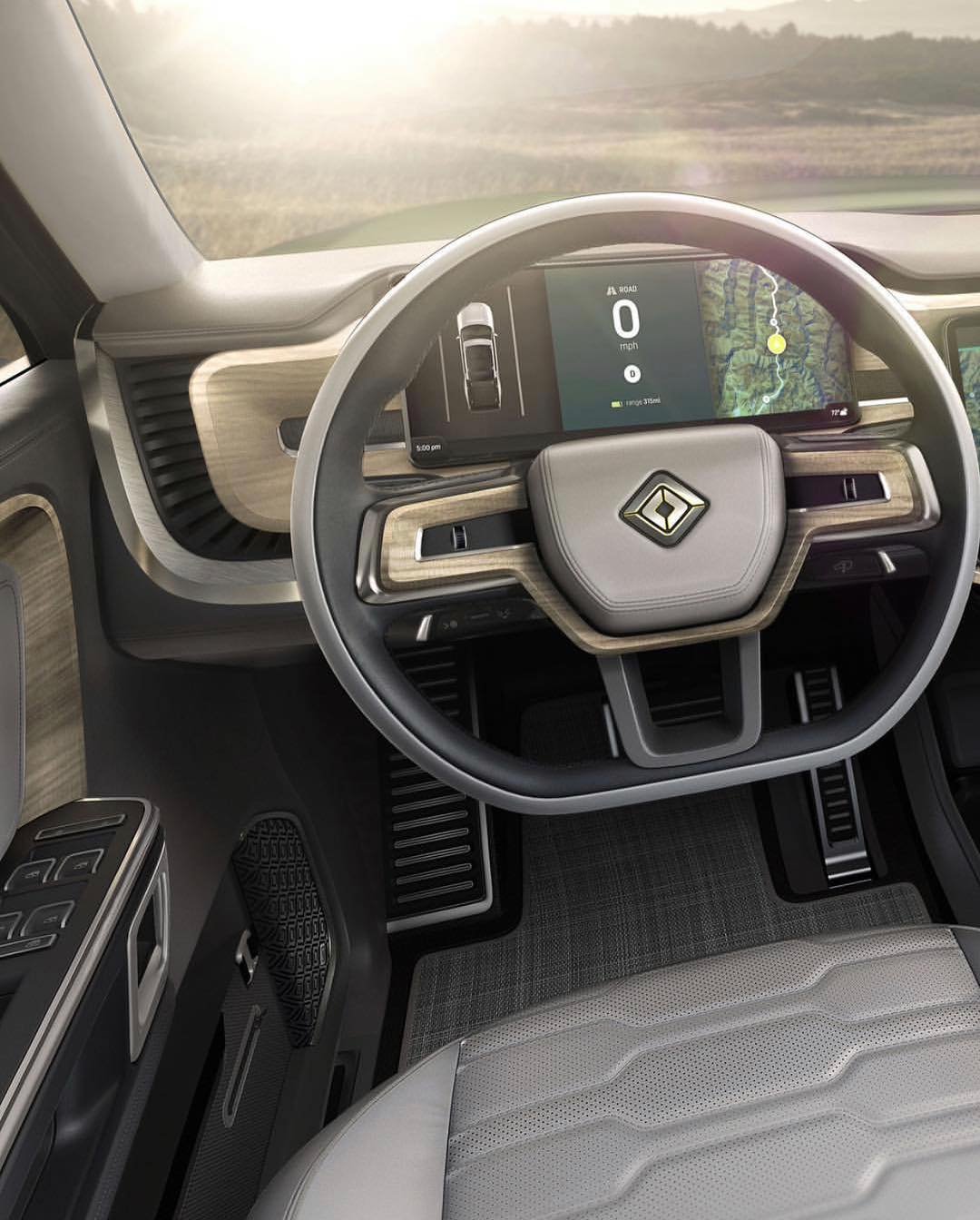 The Rivian all electric R1S is... - RAD Studio Architecture