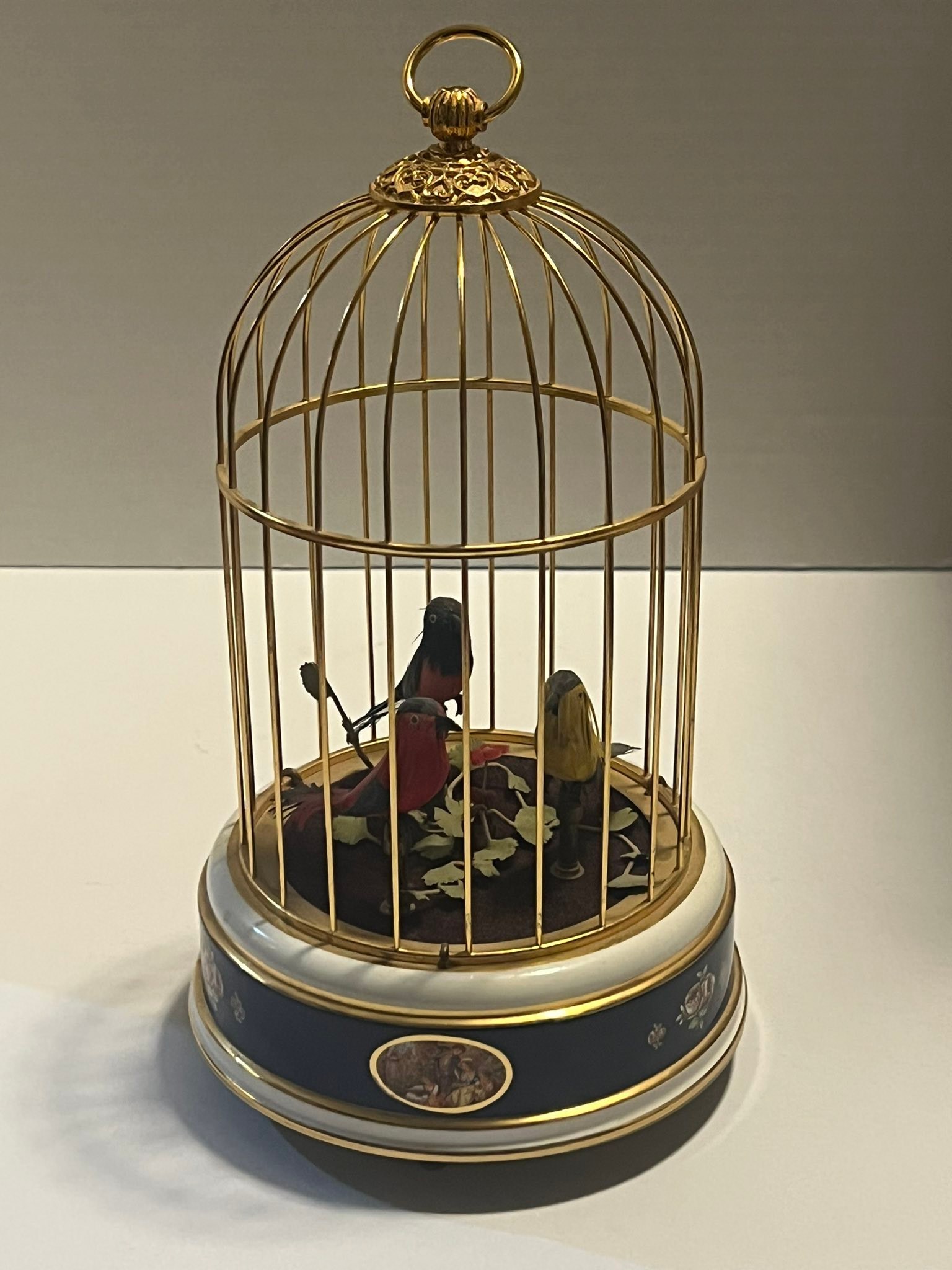 Value of antique wind up musical bird?