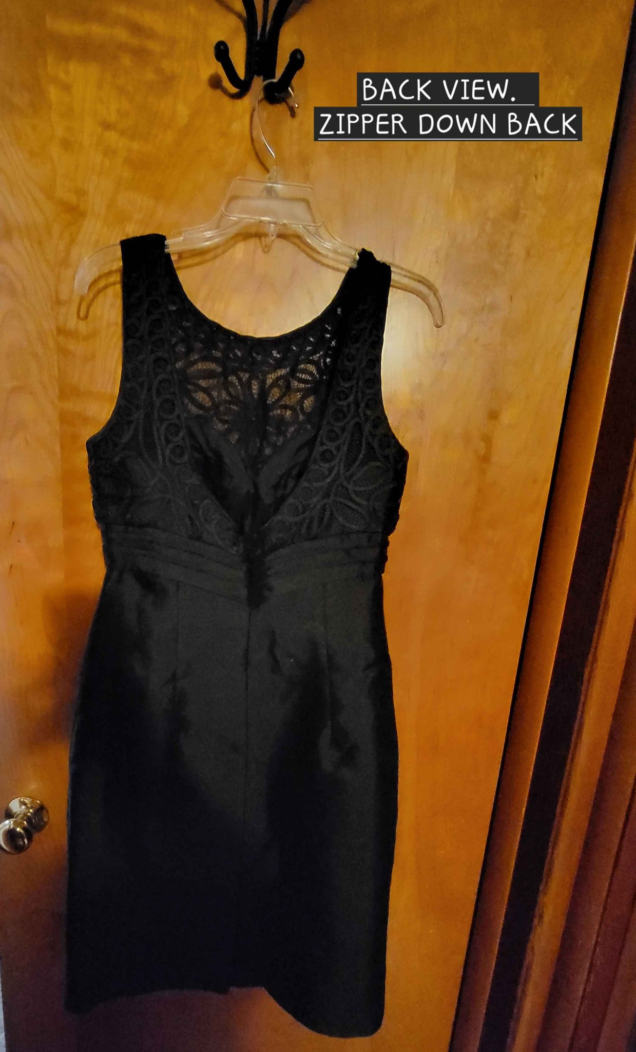 black dress with gold zipper down the back Very pretty little dress. Size 6. Brand tag removed for comfort, so brand unknown, but nice quality. Great condition. Zips up and includes built in bra/support. Beautiful detailing. $20 OBO exposed back zipper dress