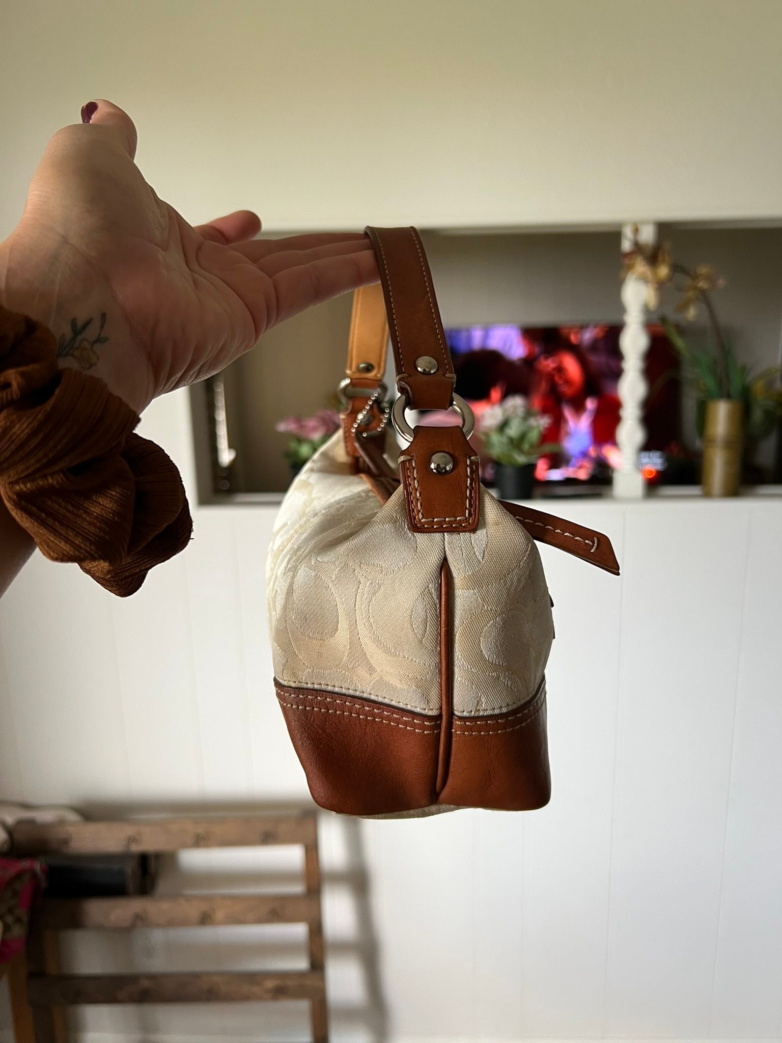 Anyone interested in a trade? This is a vintage (1996) Coach 