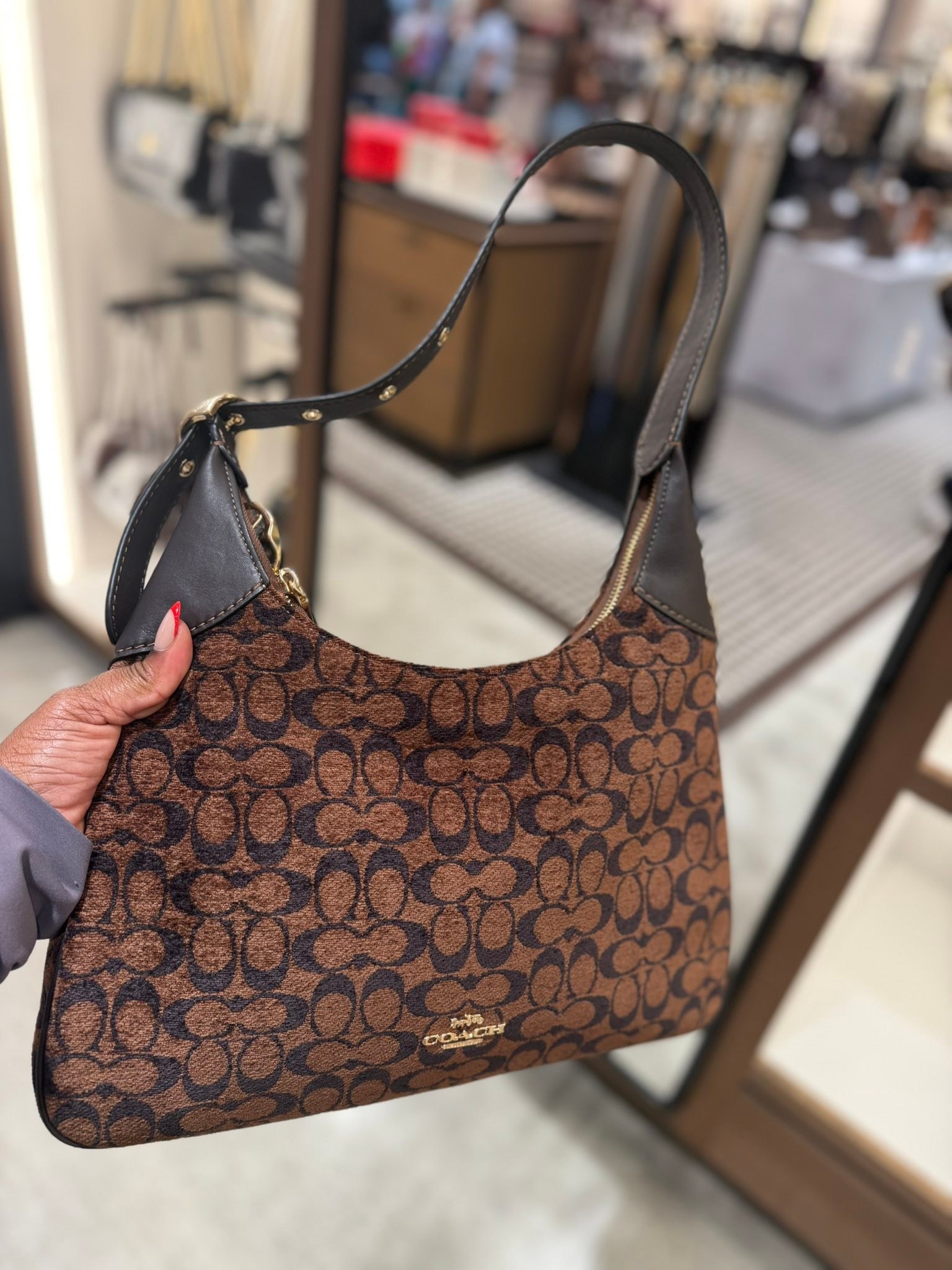 The nostalgia of seeing a vintage Coach we adored being worn by a 