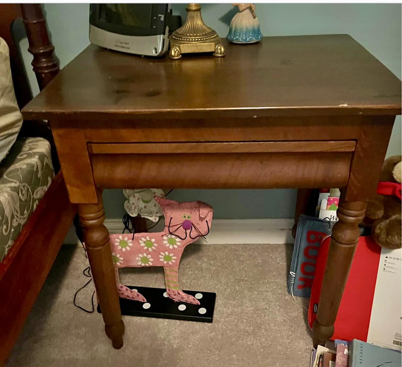 What is the story behind this antique table with a false bottom