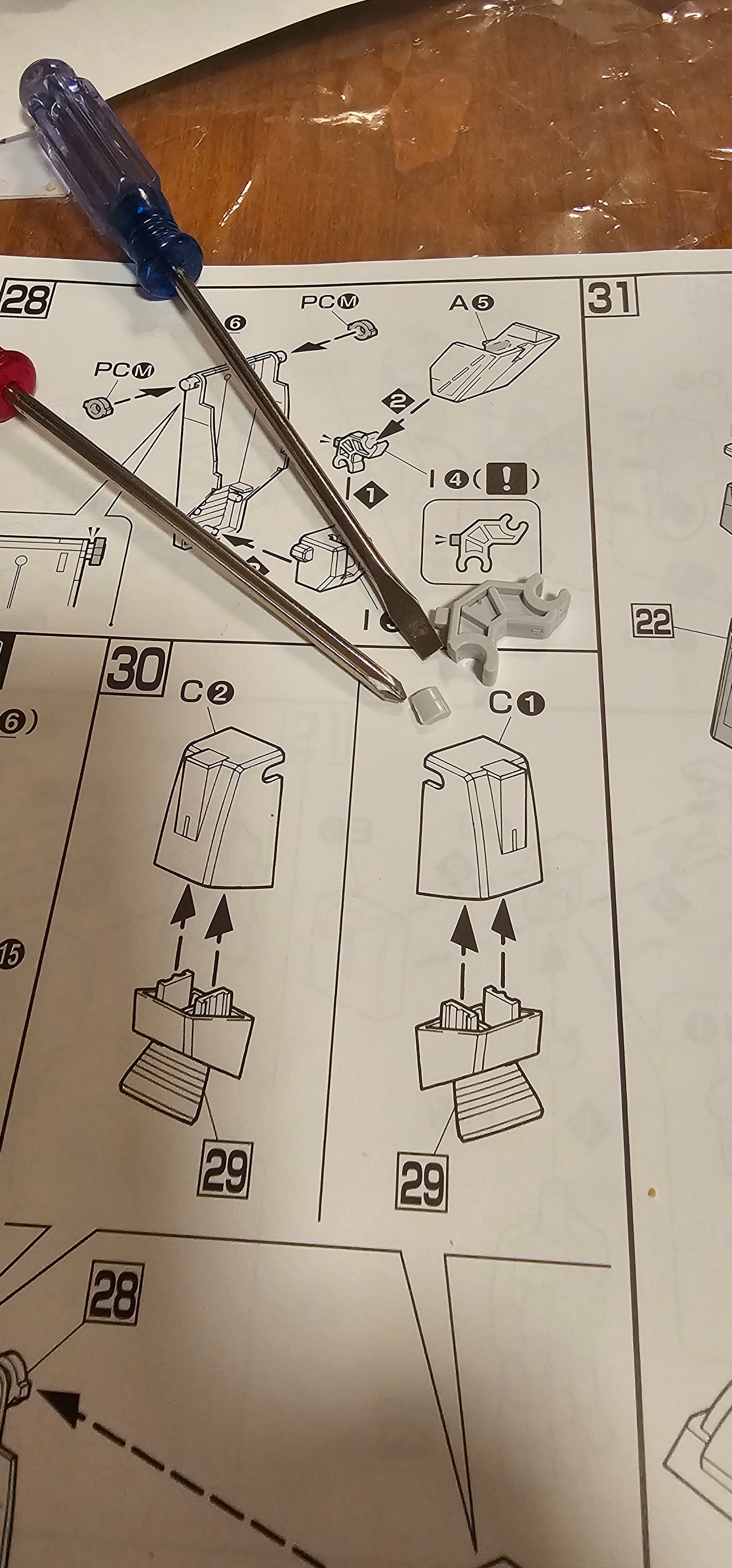 How to fix or replace a broken piece on a Gunpla model?