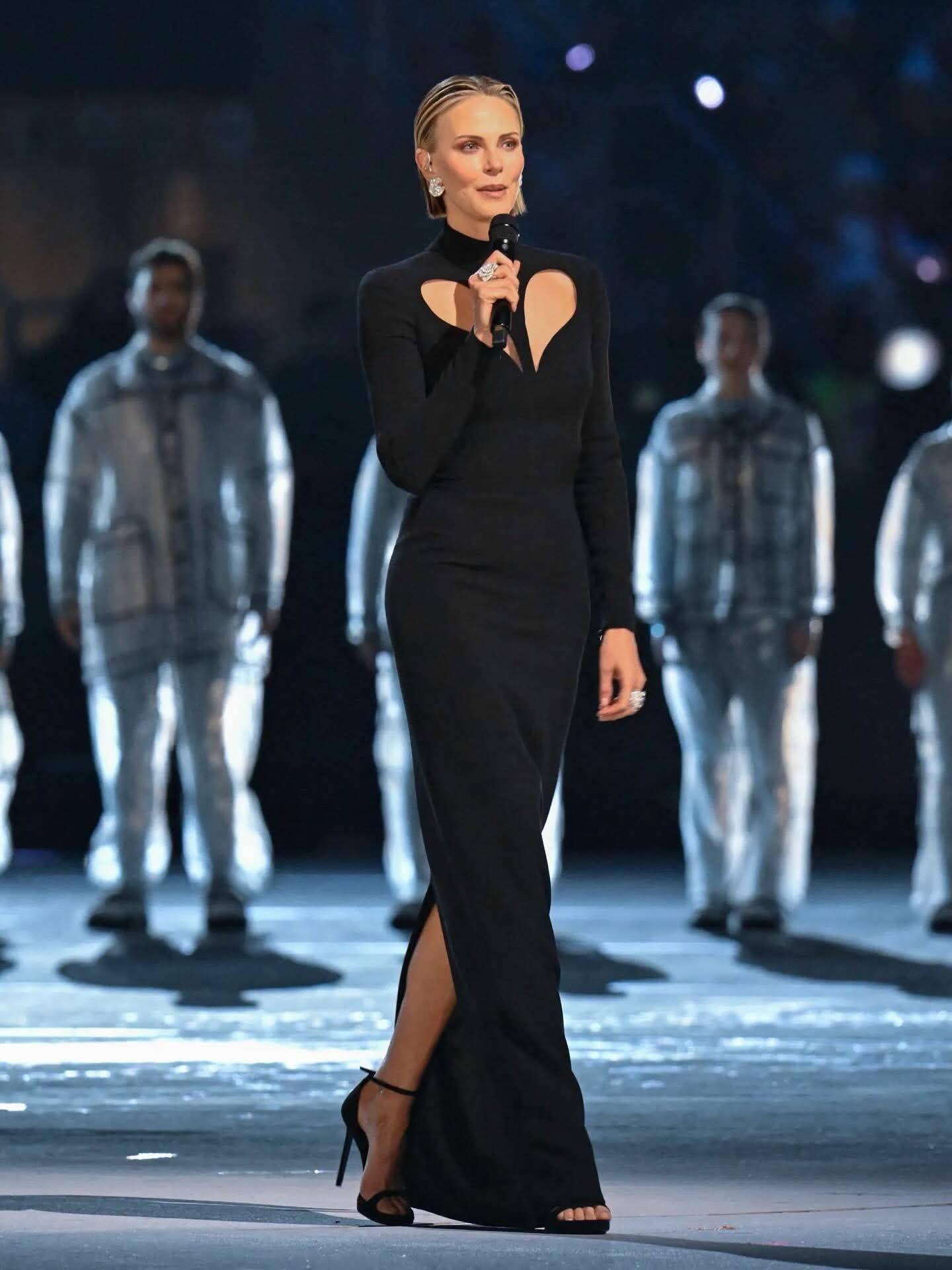 Charlize Theron wears Versace Atelier at the Opening Ceremony of 