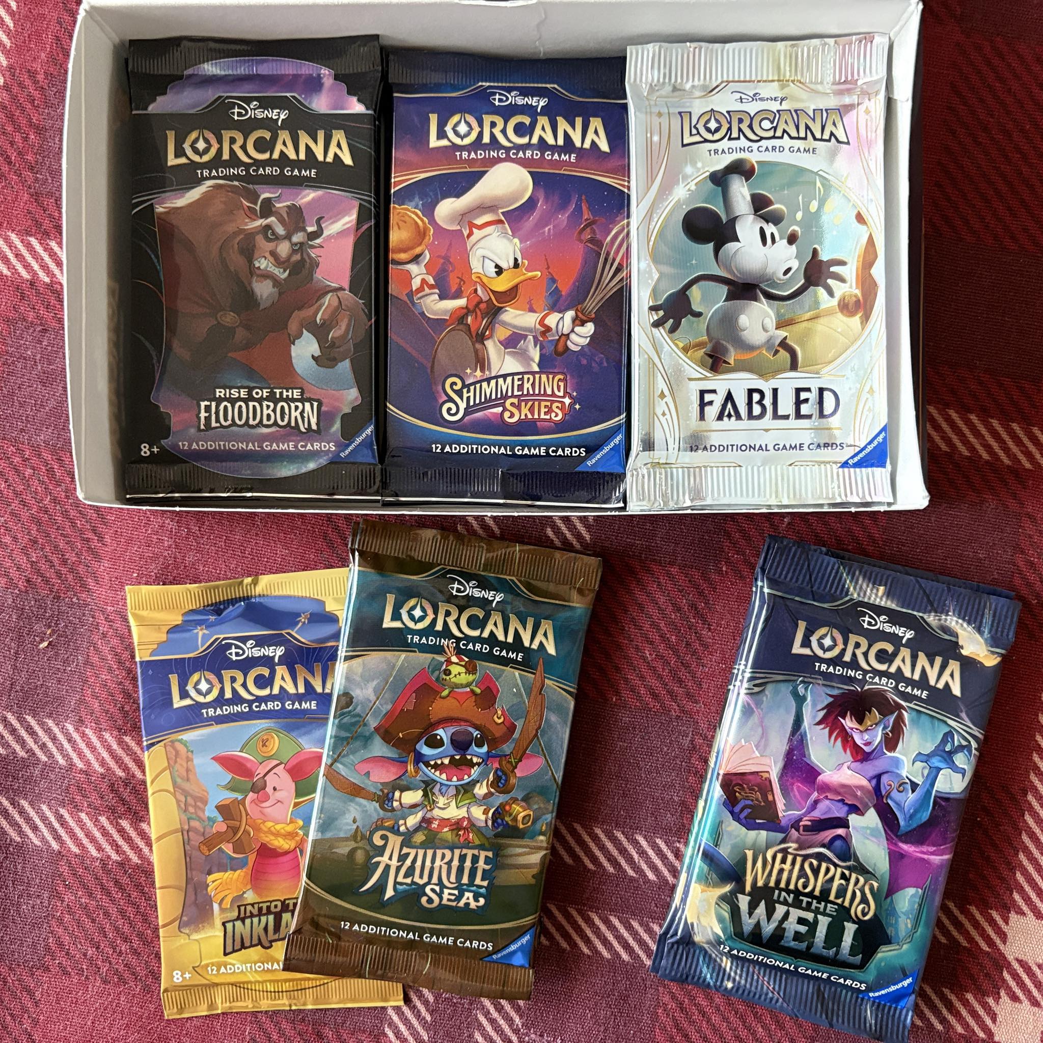 disney lorcana booster box retail price Ravensburger TCG: Into The Inklands Pack Display | 24 Packs with 12 Trading Cards Each | Ideal for Collectors & Disney Fans Reaching into the sky Disney Lorcana's Wilds Unknown is