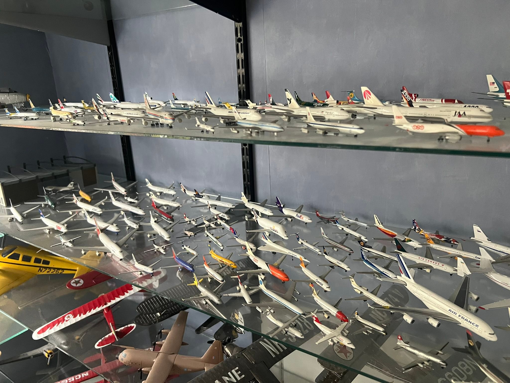 Hand-carved 1/144 scale model aircraft collection