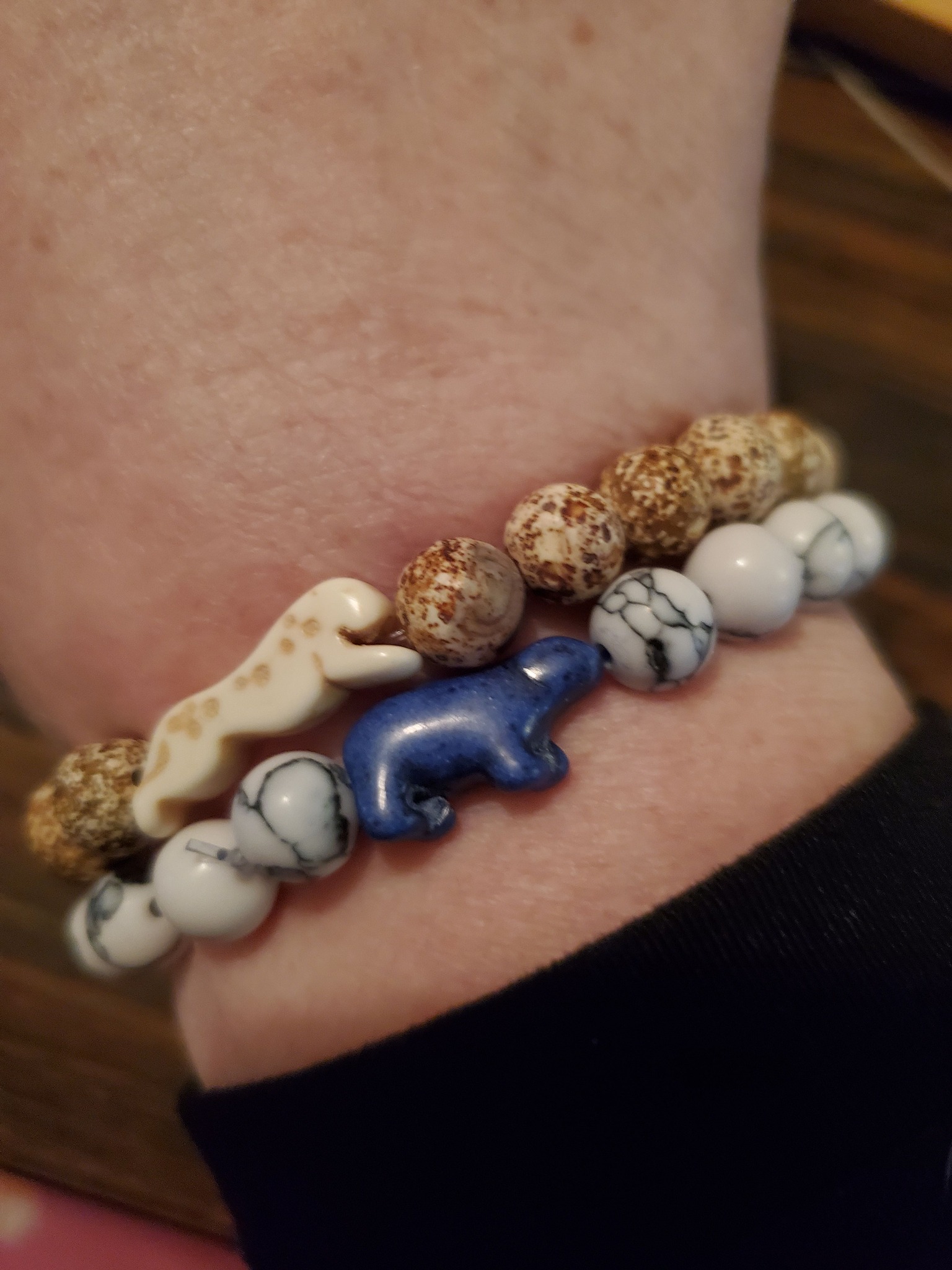 I got 2 more bracelets. Jacomina the Cheetah and Khione the Polar 