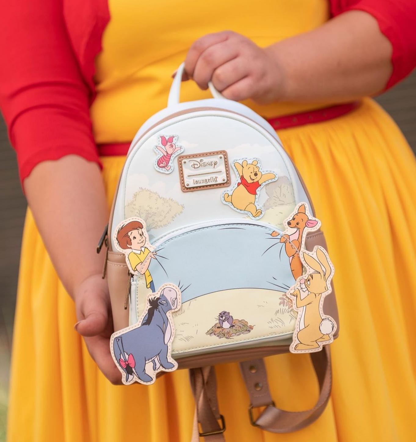 disney winnie the pooh 95th anniversary mini backpack Triple Pocket This micro mini backpack is smaller than our traditional mini backpack silhouette Top - We are back