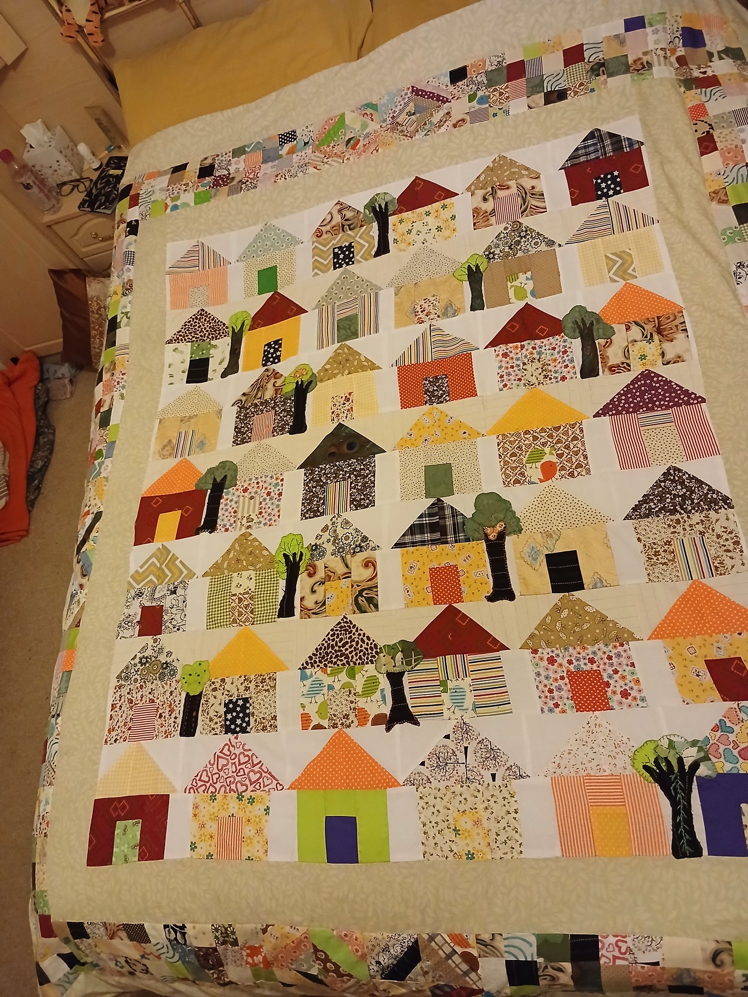 Quilt cover with 1950s fabric scraps and embroidery