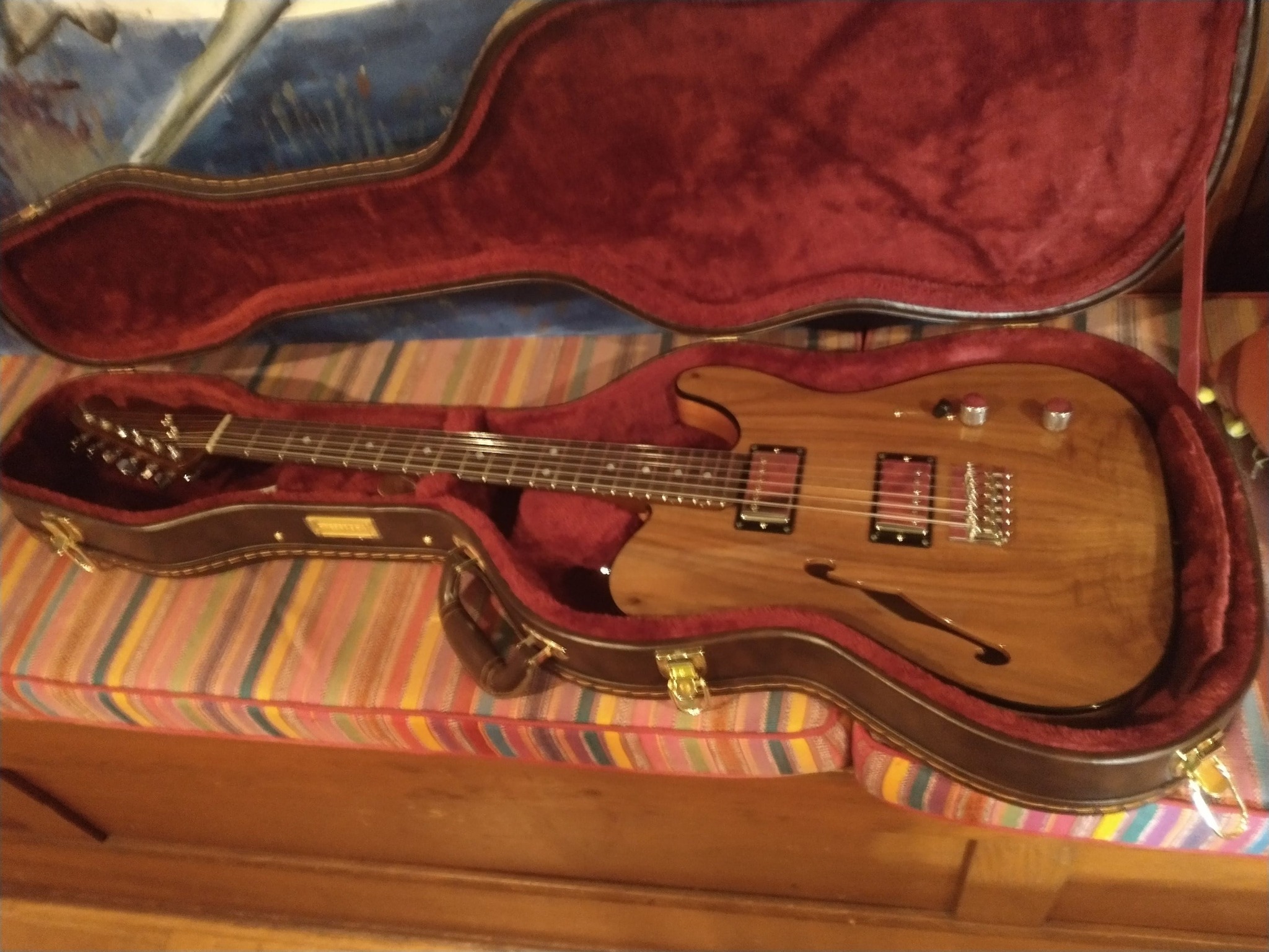 This is my Warmoth Gecko custom 5 string. Hawaiian Koa body, then