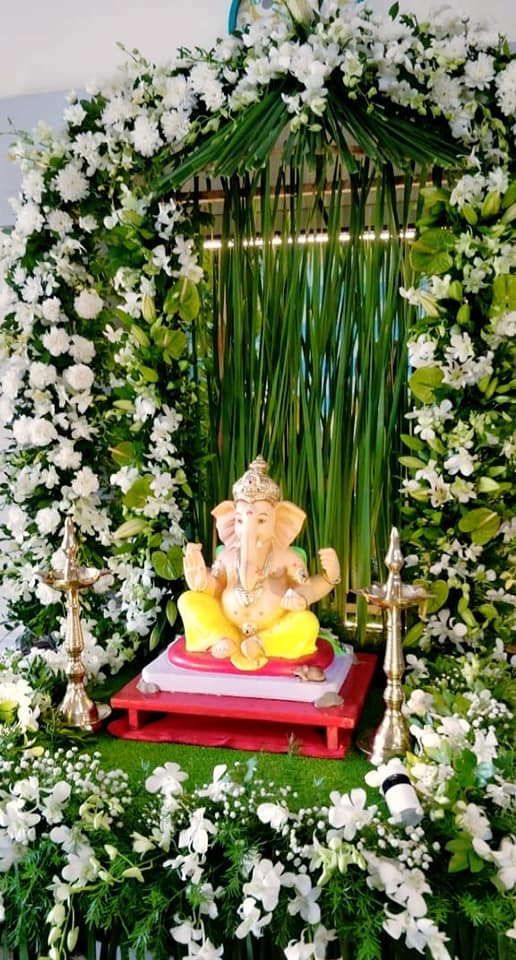 Ganpati mandap decorated with vibrant flowers symbolising peace amid global conflict