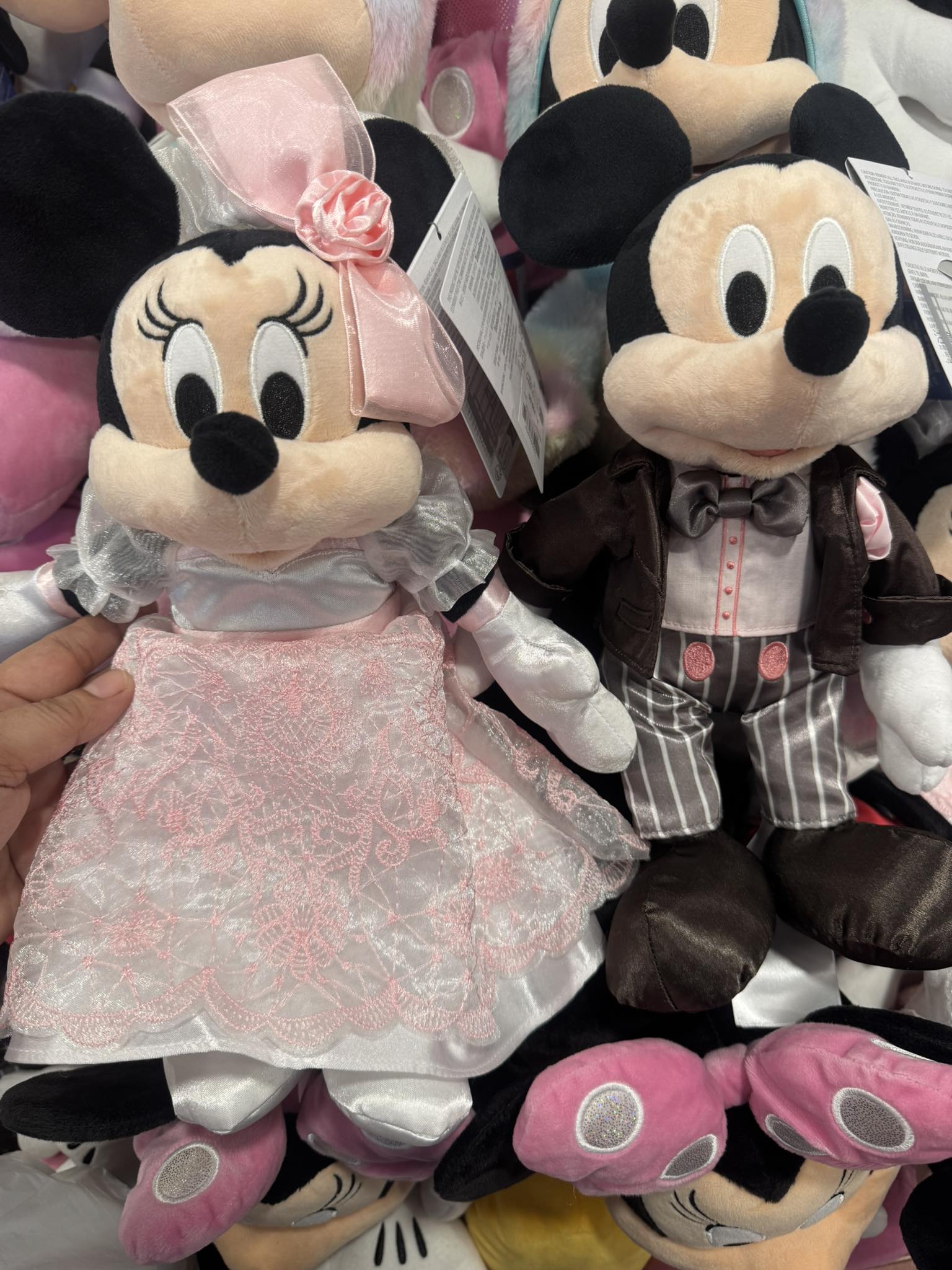 Here comes the bride! Mickey & Minnie wedding plushes arrive at