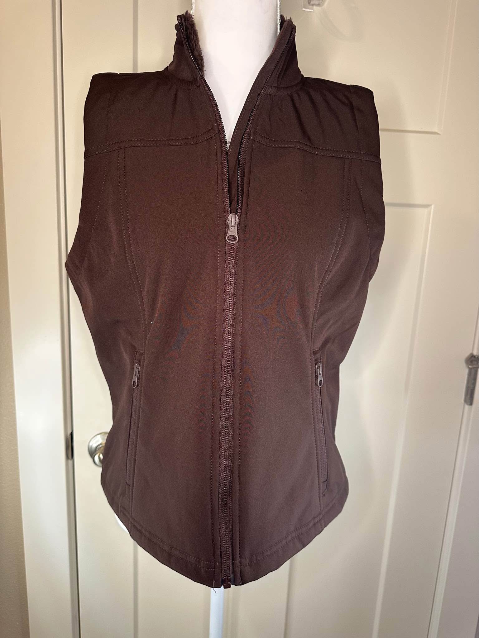 Warm and stylish Shyanne softshell vest in a rich chocolate brown 