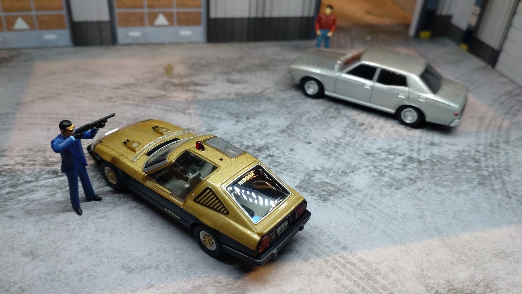 A 1/64 scale Tomica Limited Vintage NEO diorama scene featuring