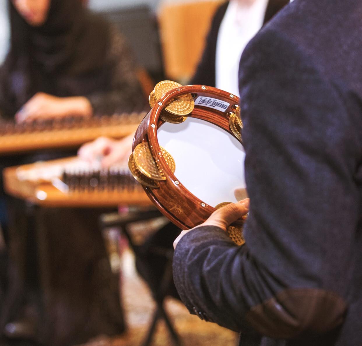 The riq is a type of tambourine used... - Qatar Music Academy