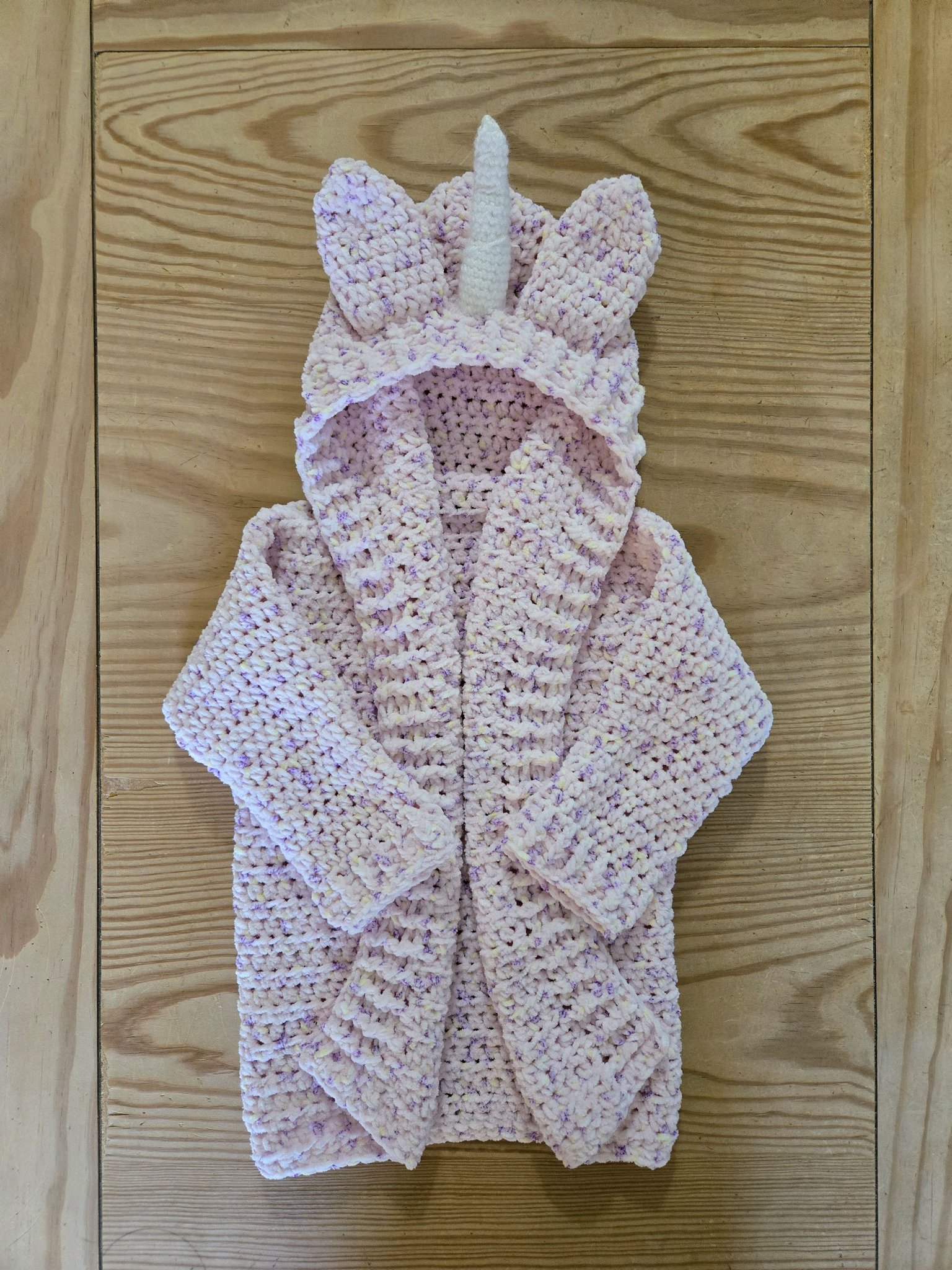 Crocheted baby sweater made with love for granddaughter