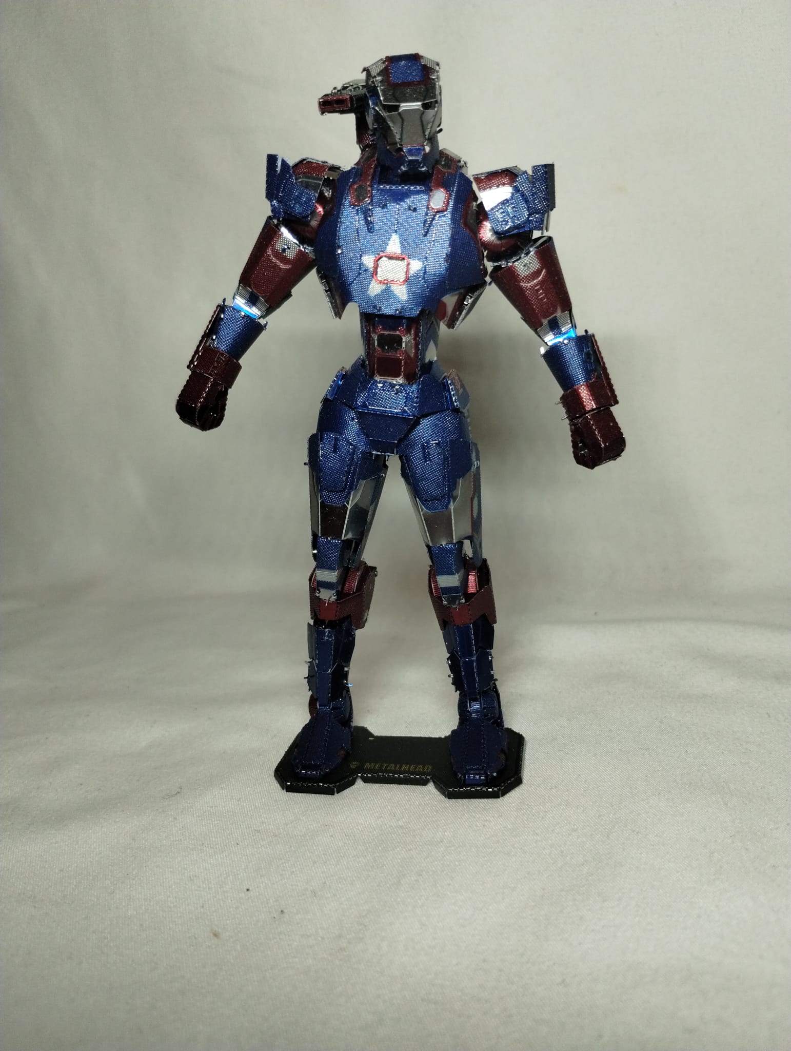 War Machine Lego figure with dark blue pauldron