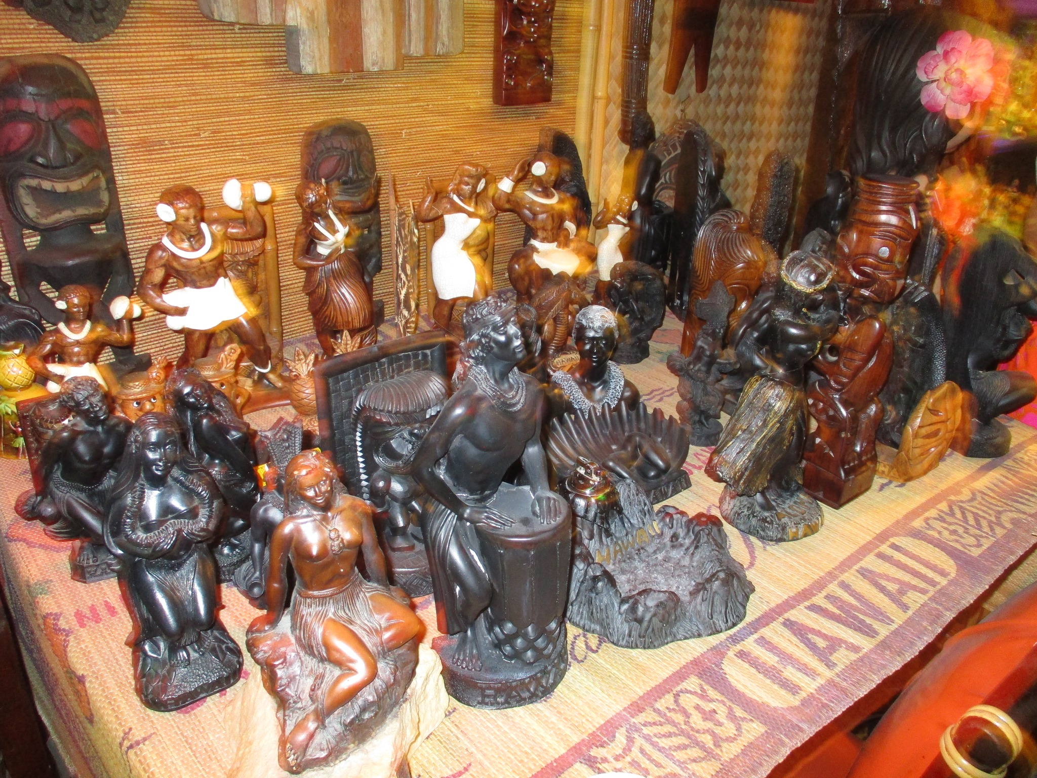 Vintage Coco Joe tiki statues as mid-century souvenirs