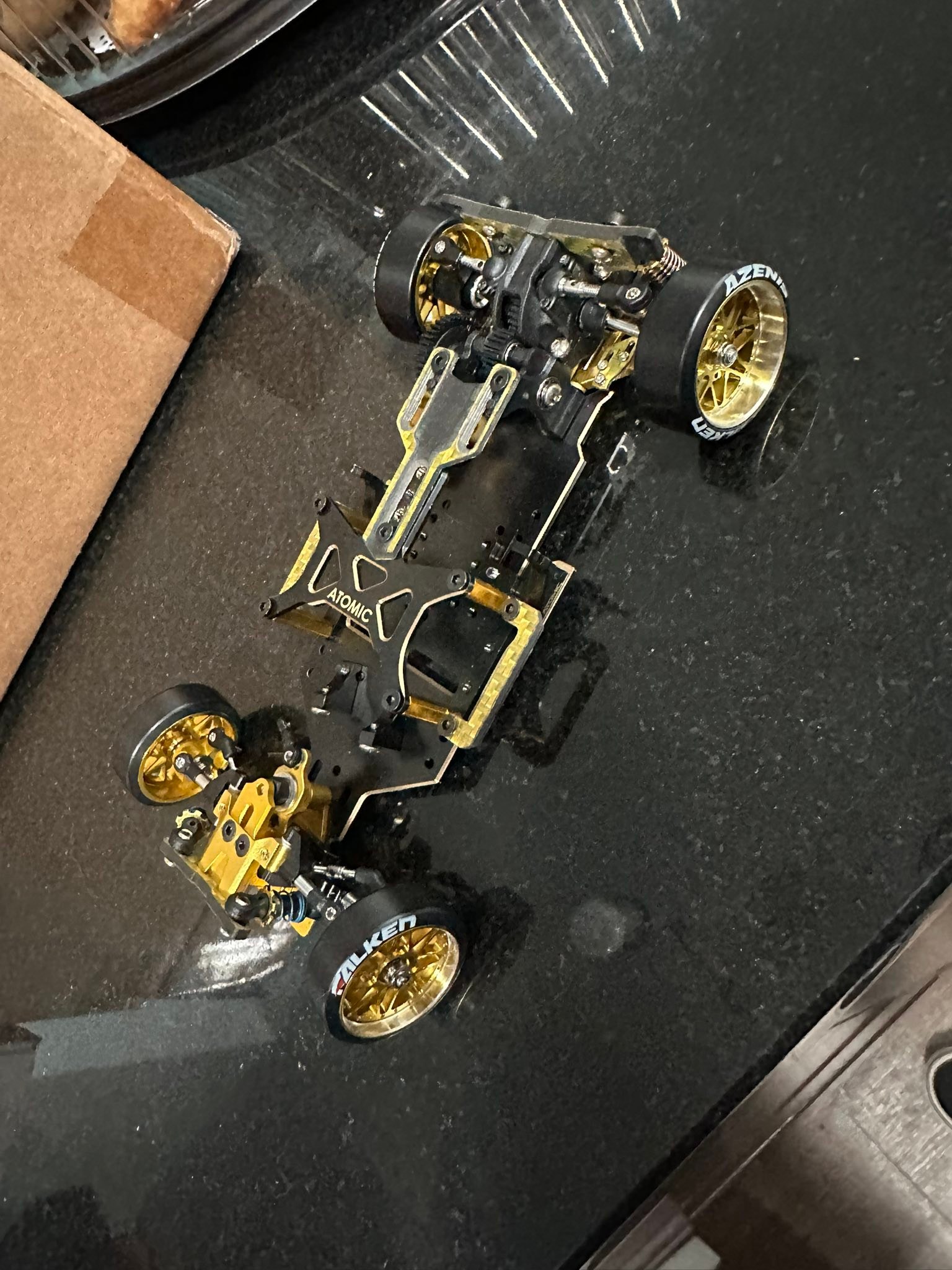 What kits can upgrade a 1/28 Atomic DRZ V2 chassis to 1/24 scale