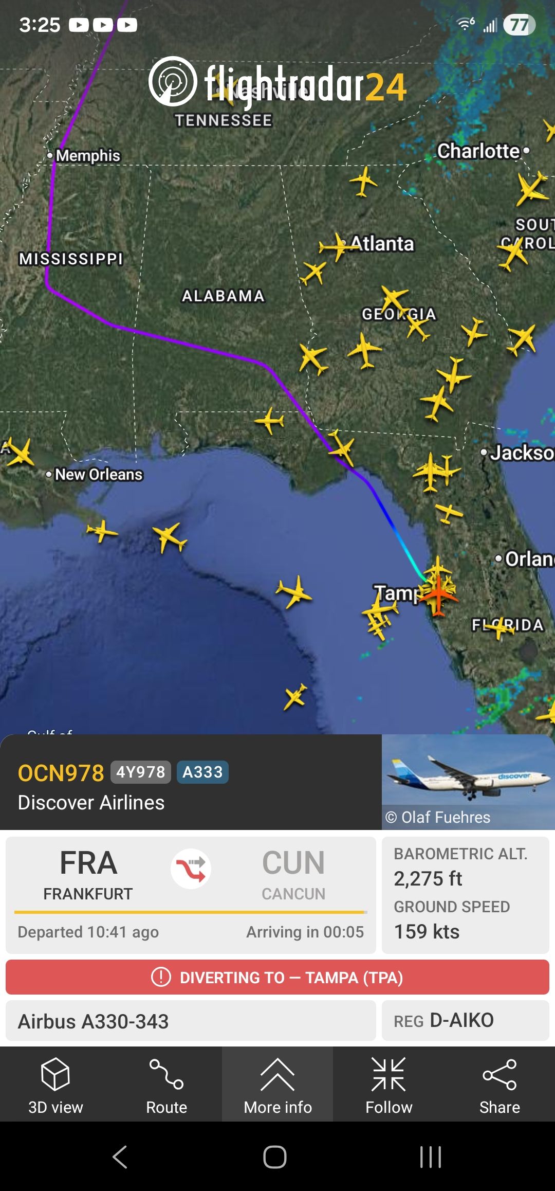 Why did flight OCN978 from Frankfurt to Cancun divert to Tampa?