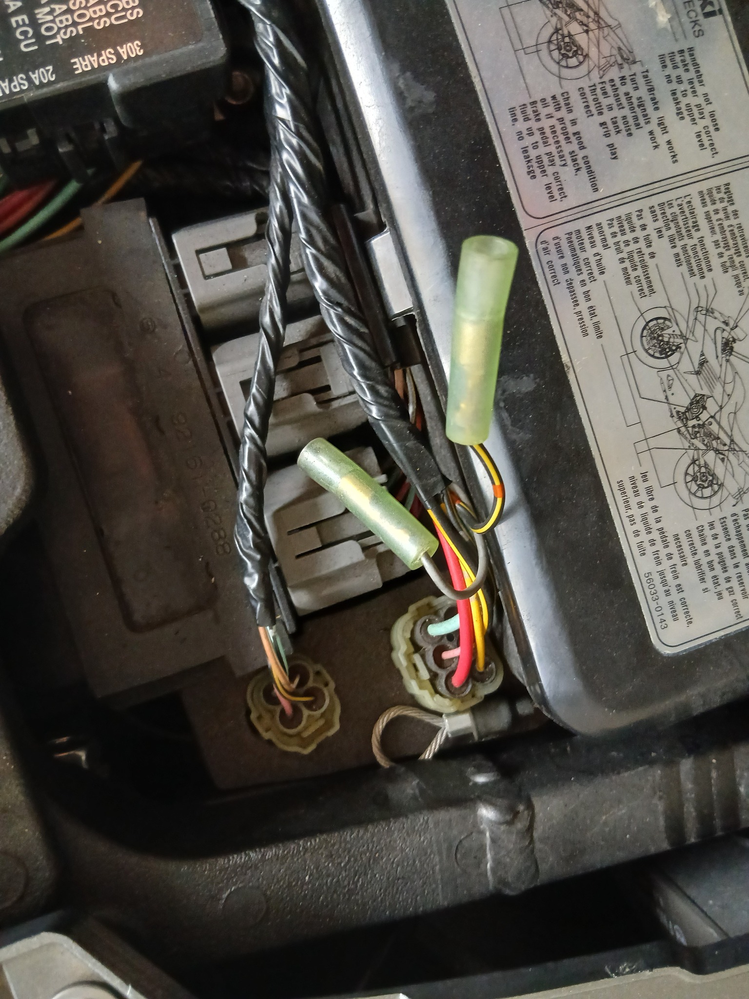 What are the mystery connectors under the seat on a 2012 Kawasaki