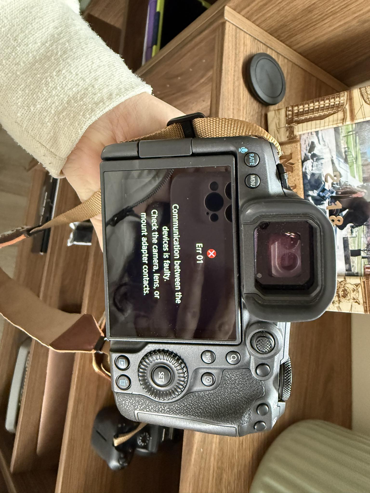 Why does my EF lens cause Err 01 on my camera?