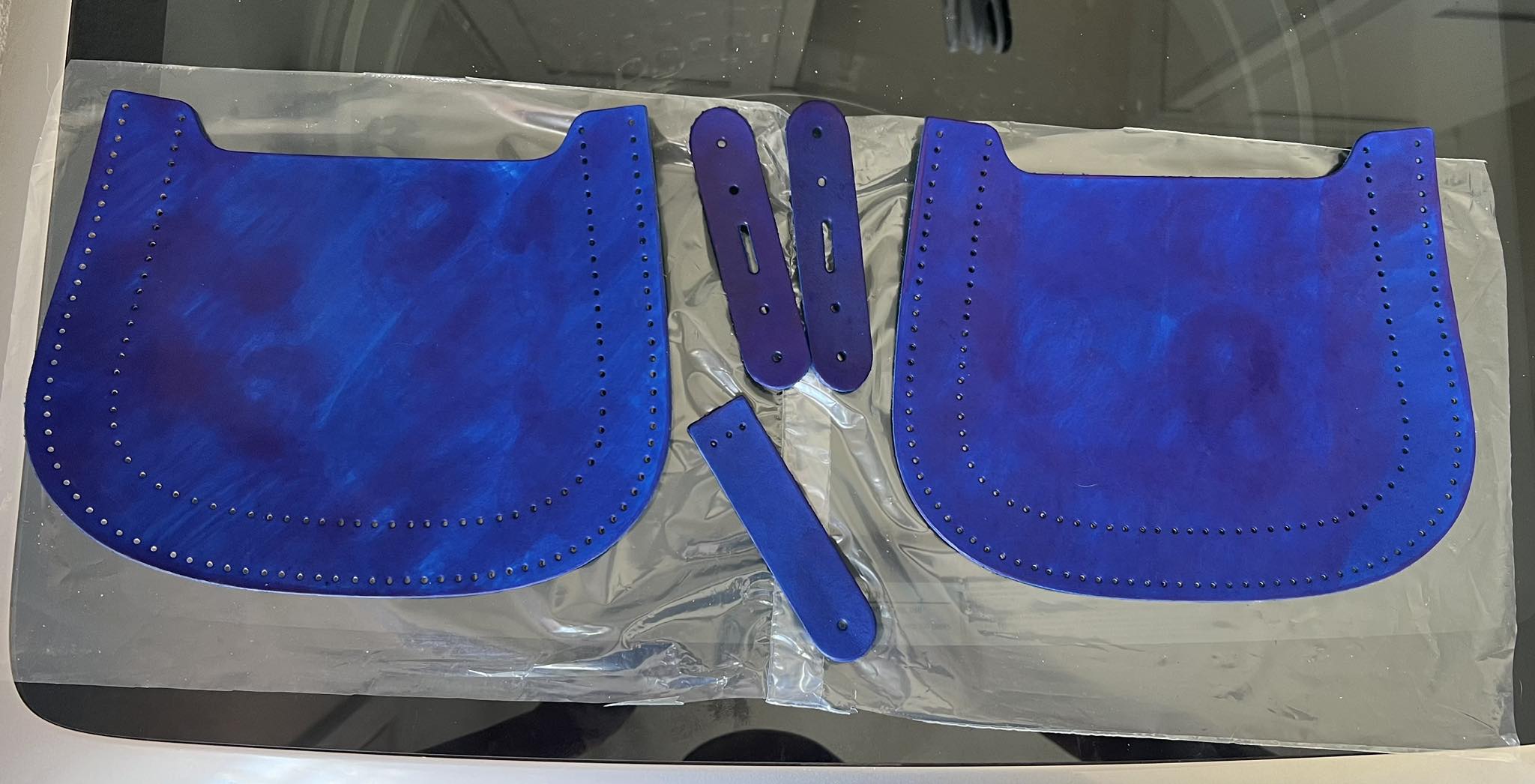 How to fix uneven navy blue leather dye?