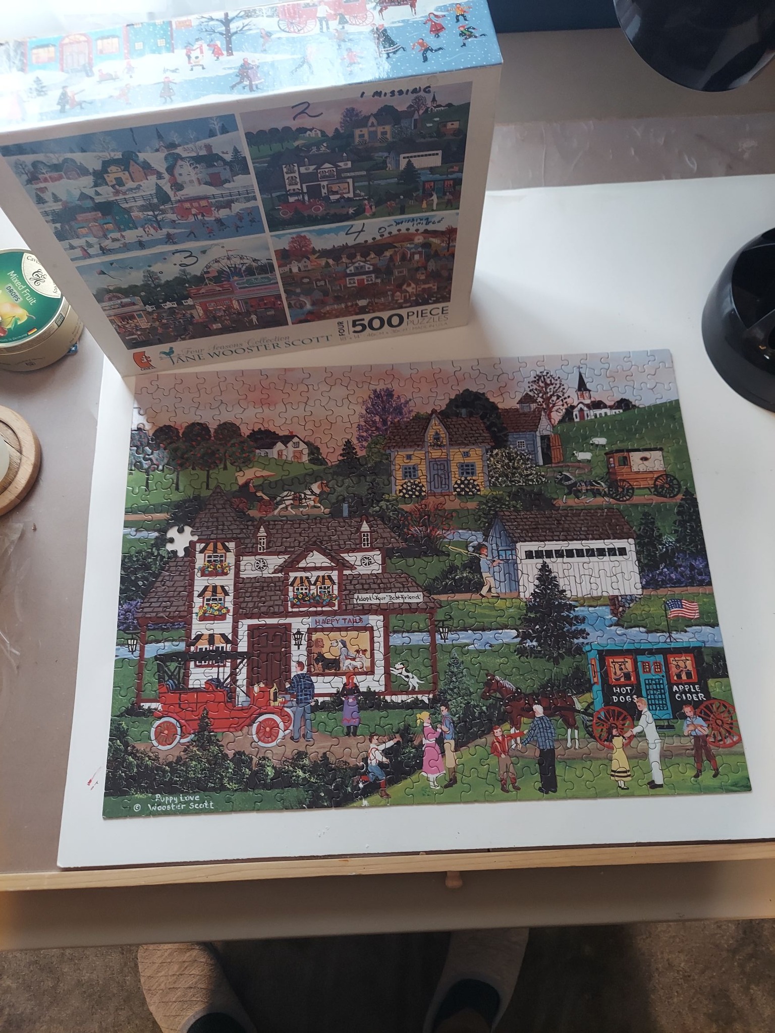 Completed 500-piece Puppy Love puzzle by Jane Wooster Scott