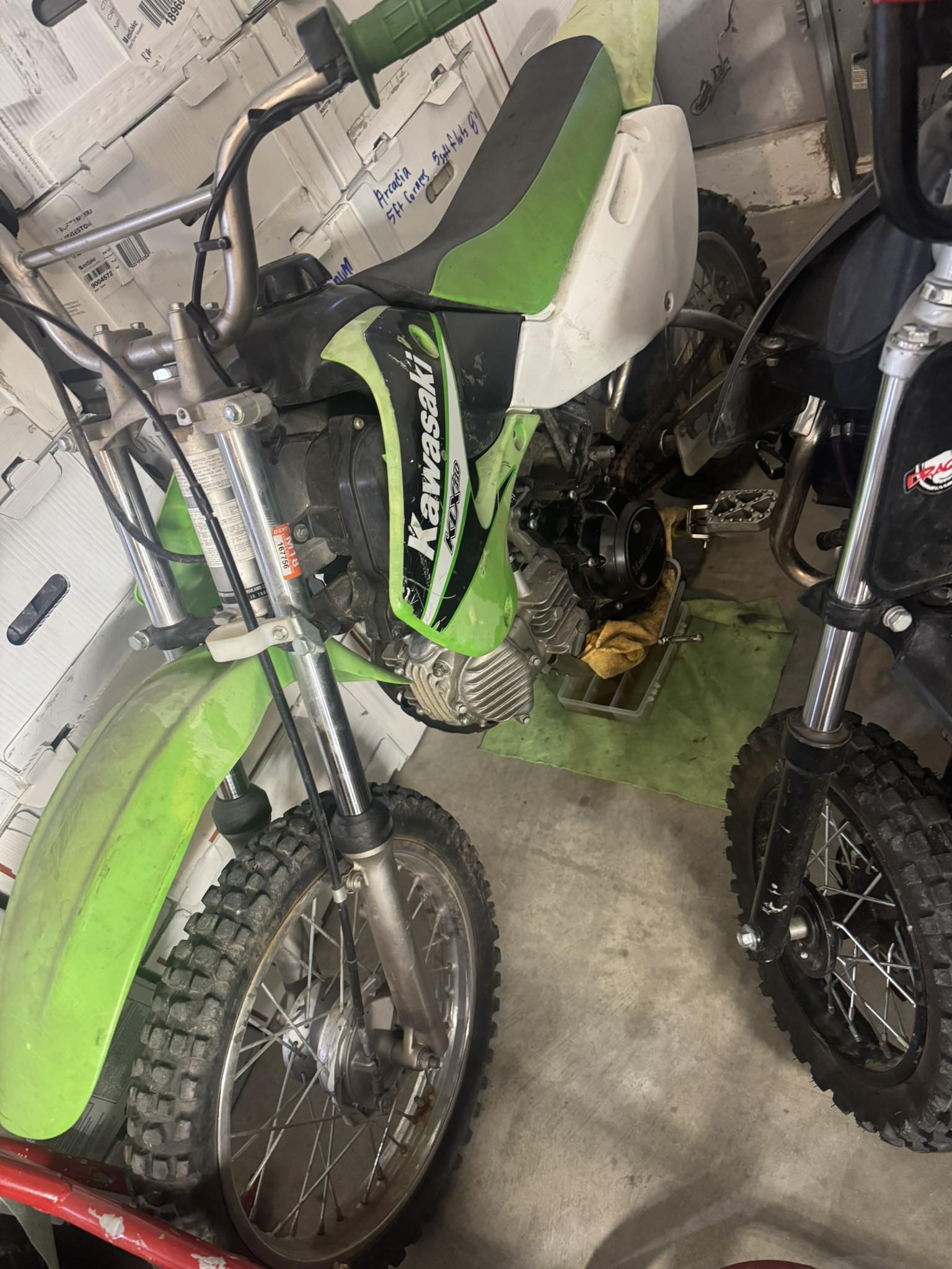 Is a worn cylinder and gaffed piston causing backfiring?