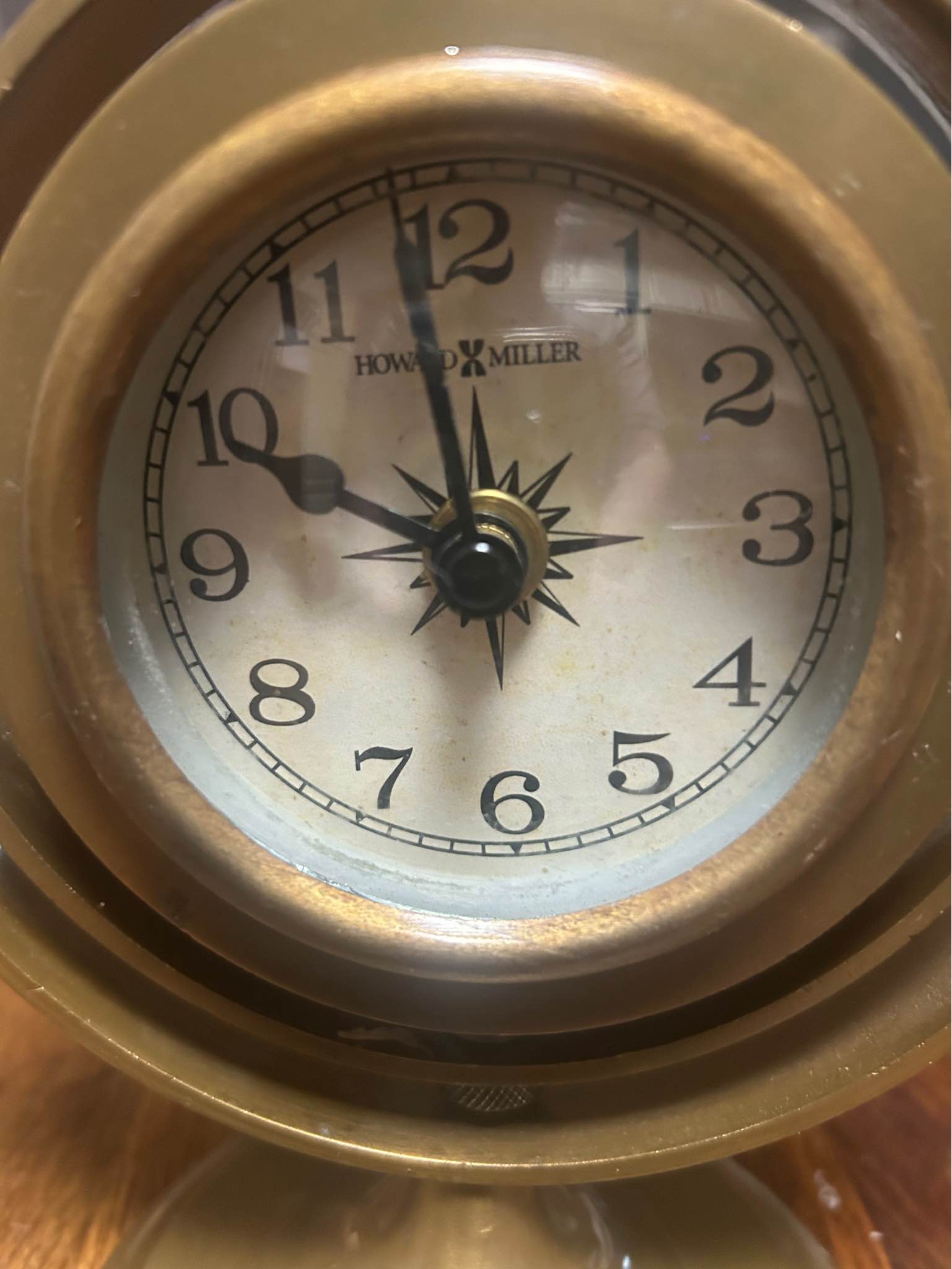 The HOWARD MILLER Gimbal Maritime Brass Mantel Clock Model 64552
