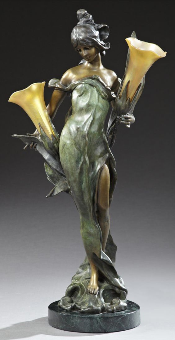 Bronze Art Nouveau lamp with a semi nude lady holding two flowers