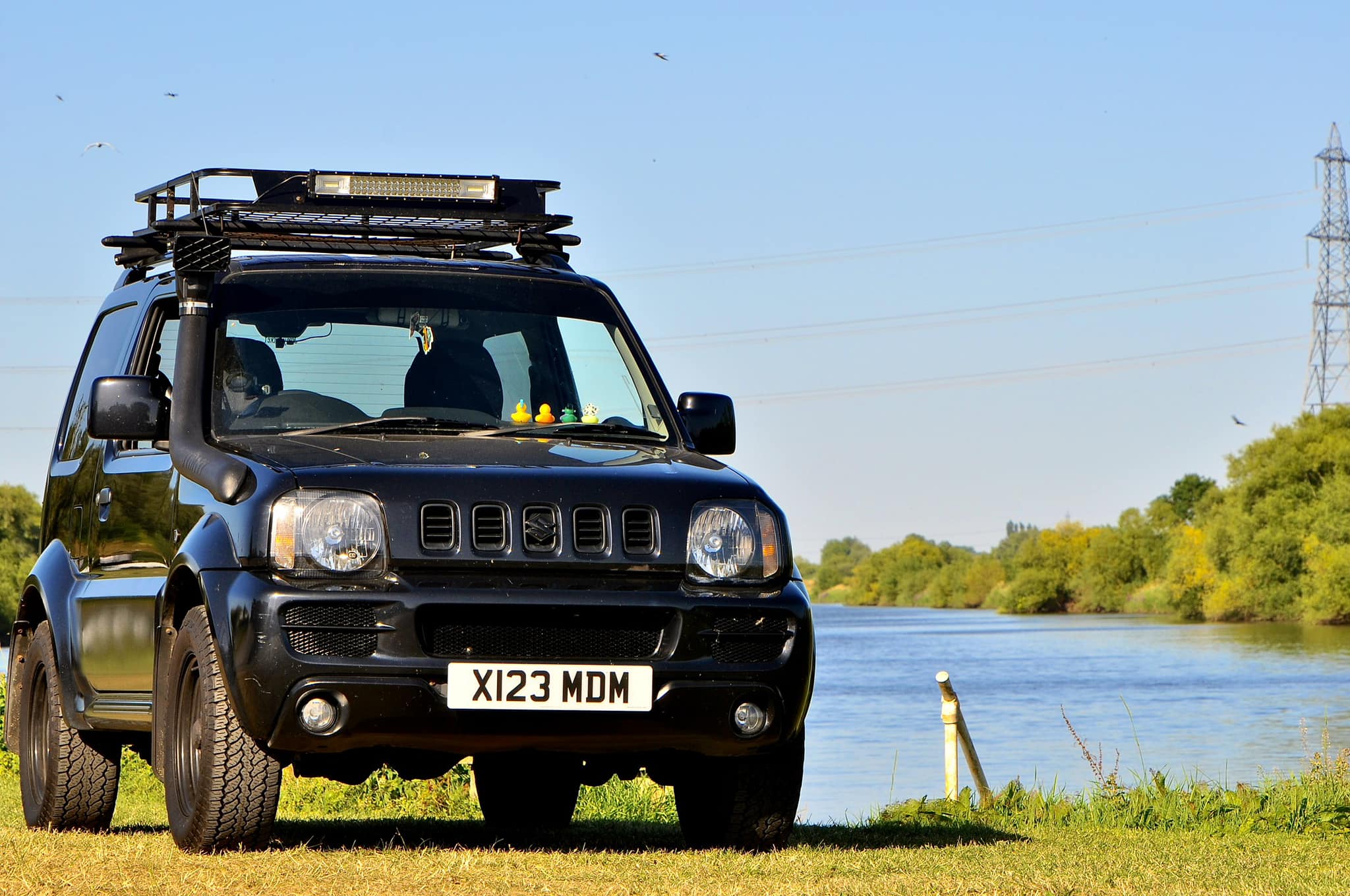 Can I use bigger rims with 215/70/15 tires on a stock Jimny?