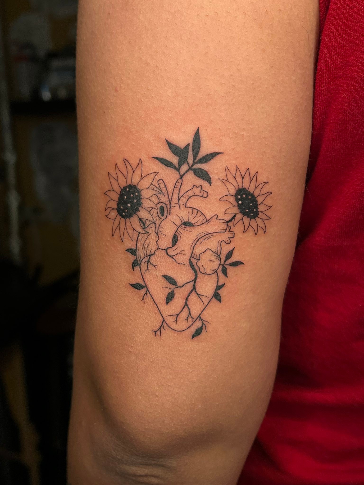 Tattoo artist for custom '13' design on Friday the 13th in Port St
