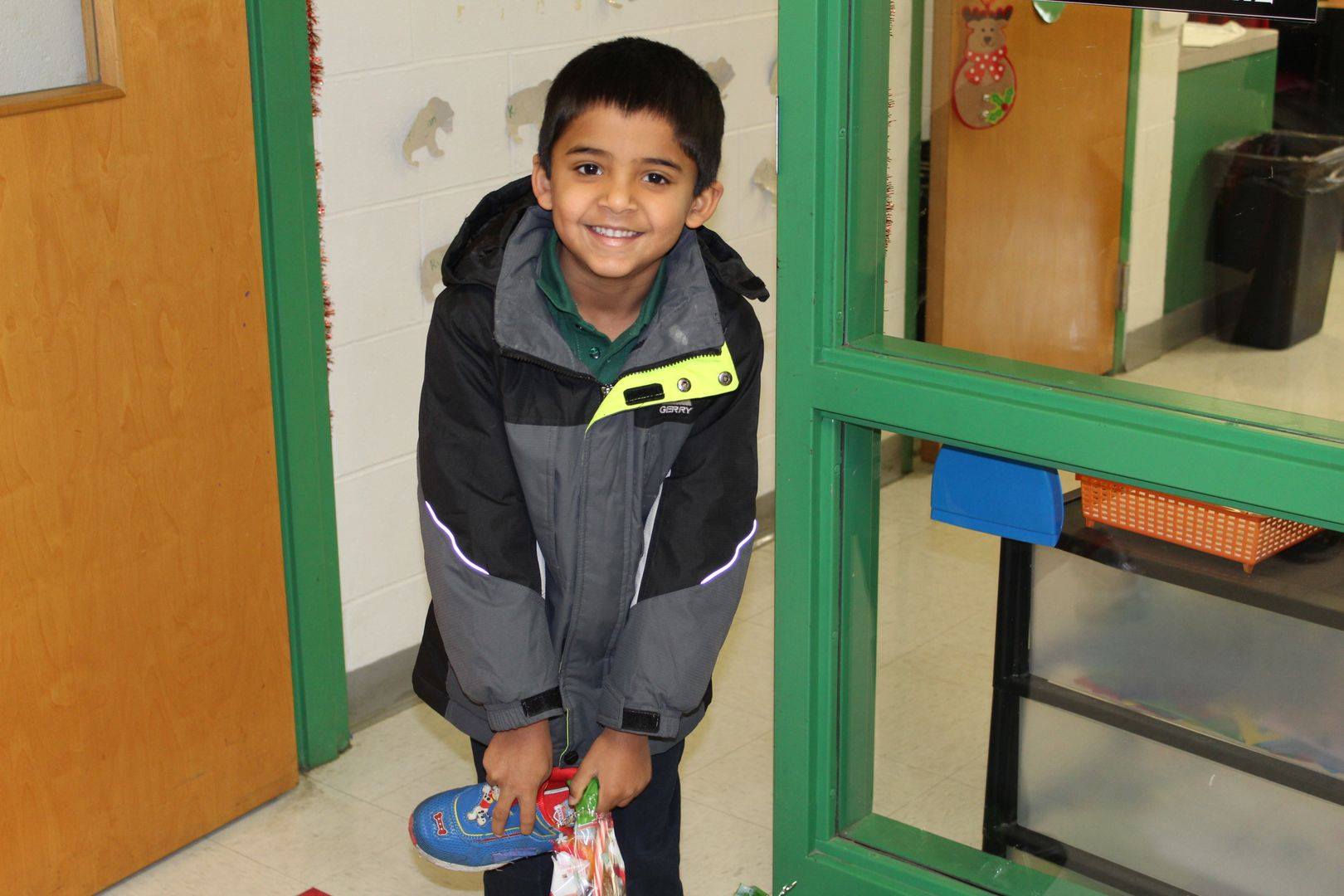 Today we celebrate the Feast of Saint... - Holy Cross School