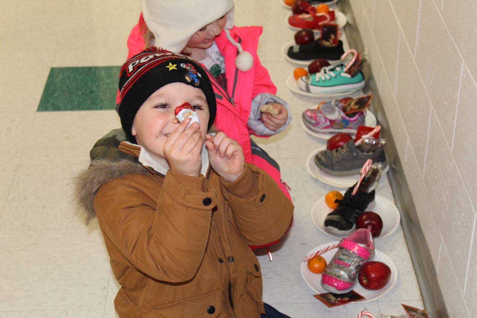 Today we celebrate the Feast of Saint... - Holy Cross School
