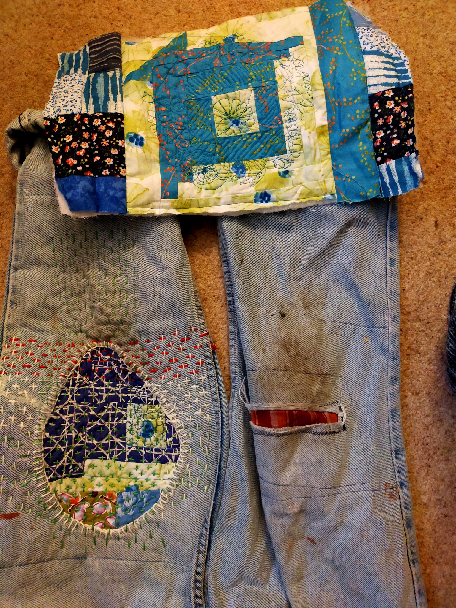 Upcycled gardening trousers with shashiko stitching patches