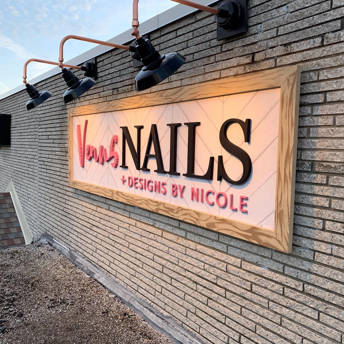 Impact GraphiX - New sign and window lettering for Venus...