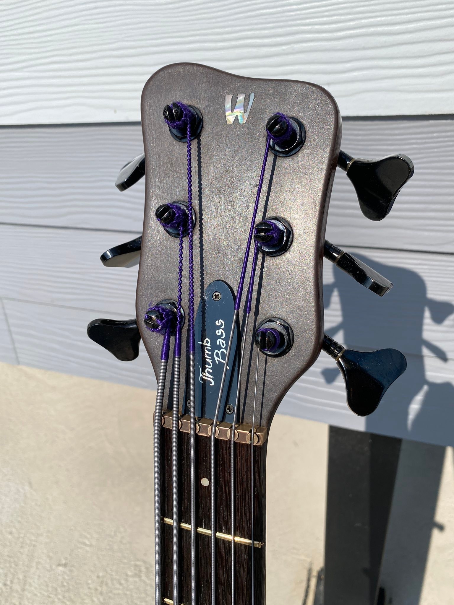 What is the value of a 1989 Warwick Thumb NT 6 string bass guitar 