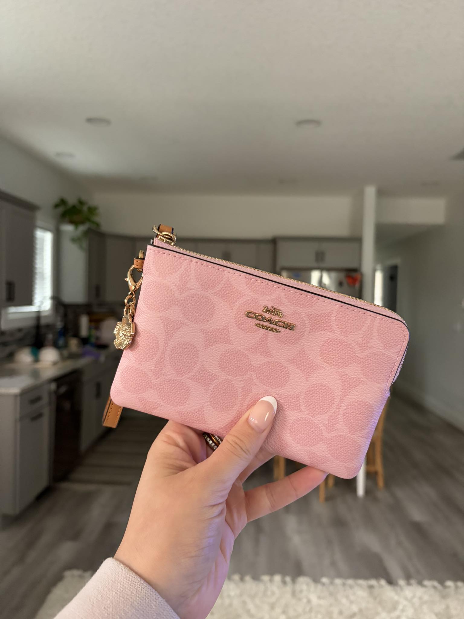 First Coach purchase: powder pink wristlet
