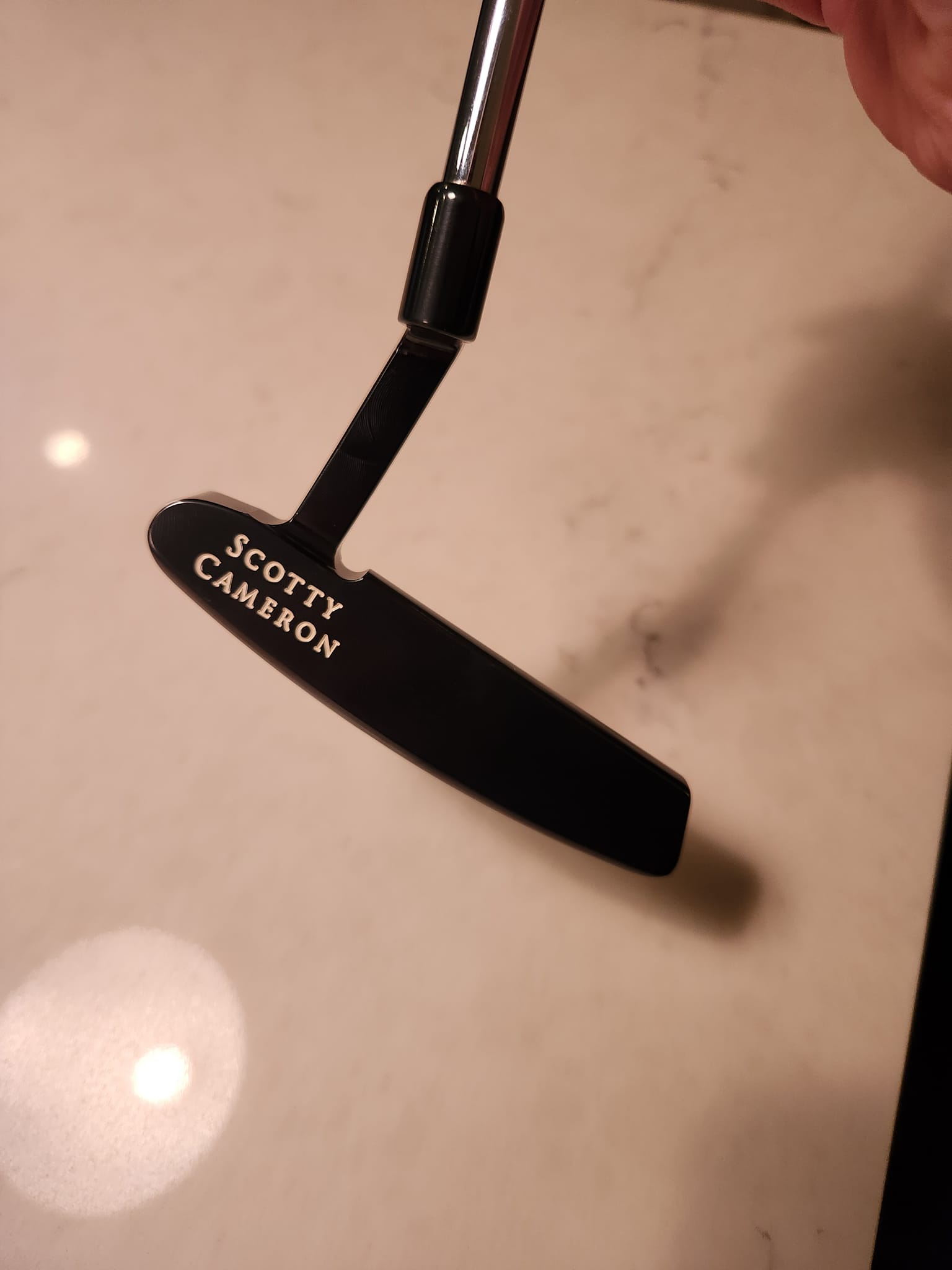 What is a Scotty Cameron LH Gun-Blue Newport putter worth?
