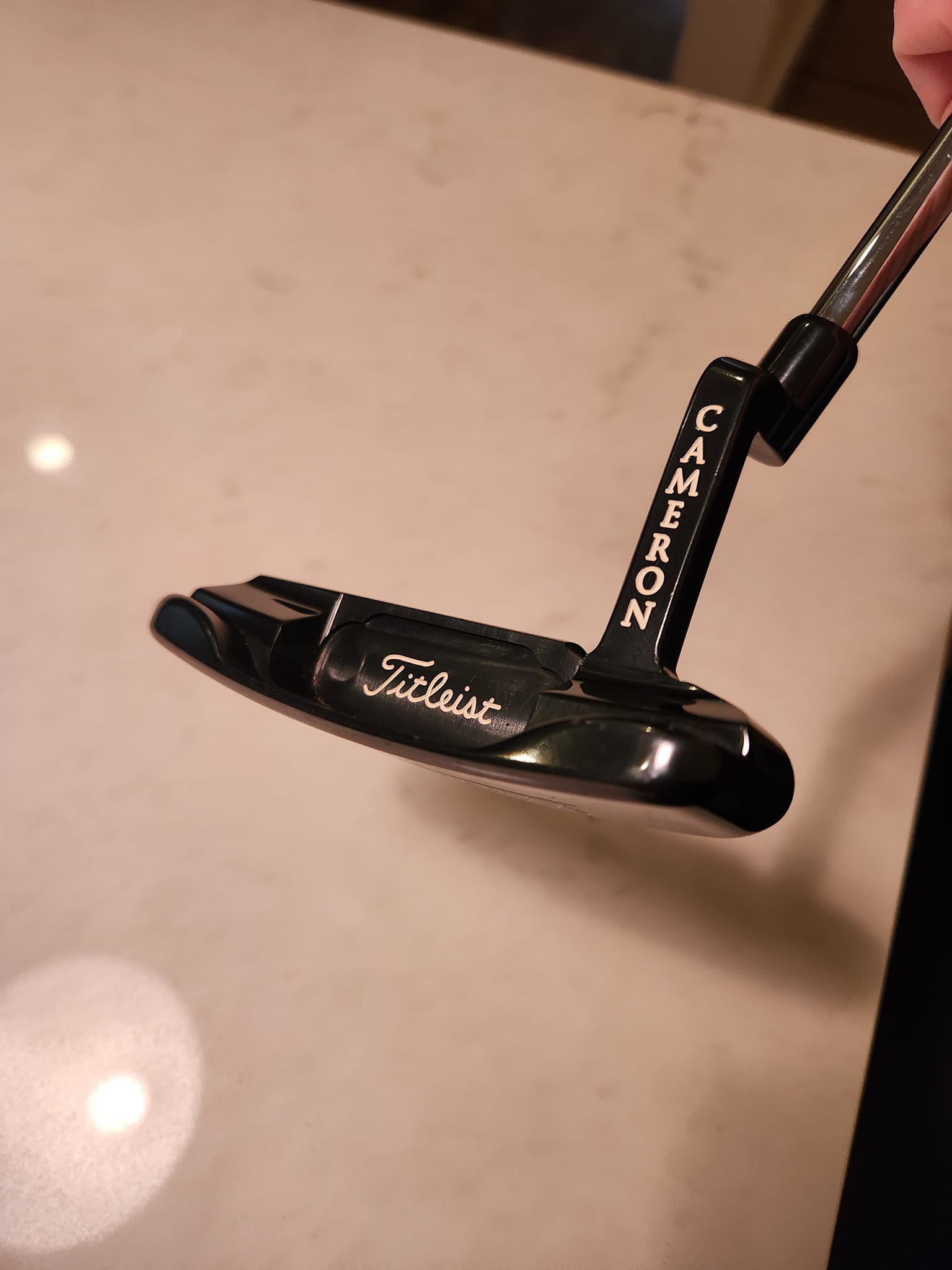What is a Scotty Cameron LH Gun-Blue Newport putter worth?