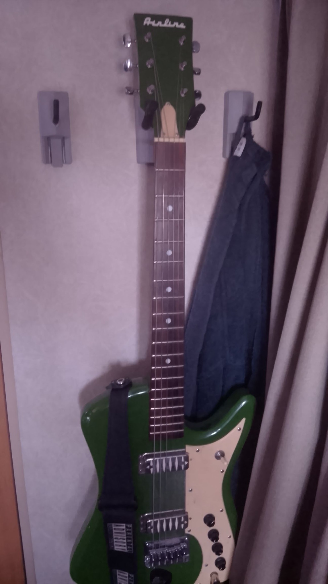 My reissue Airline made by Eastwood Guitars. This is in Open E and