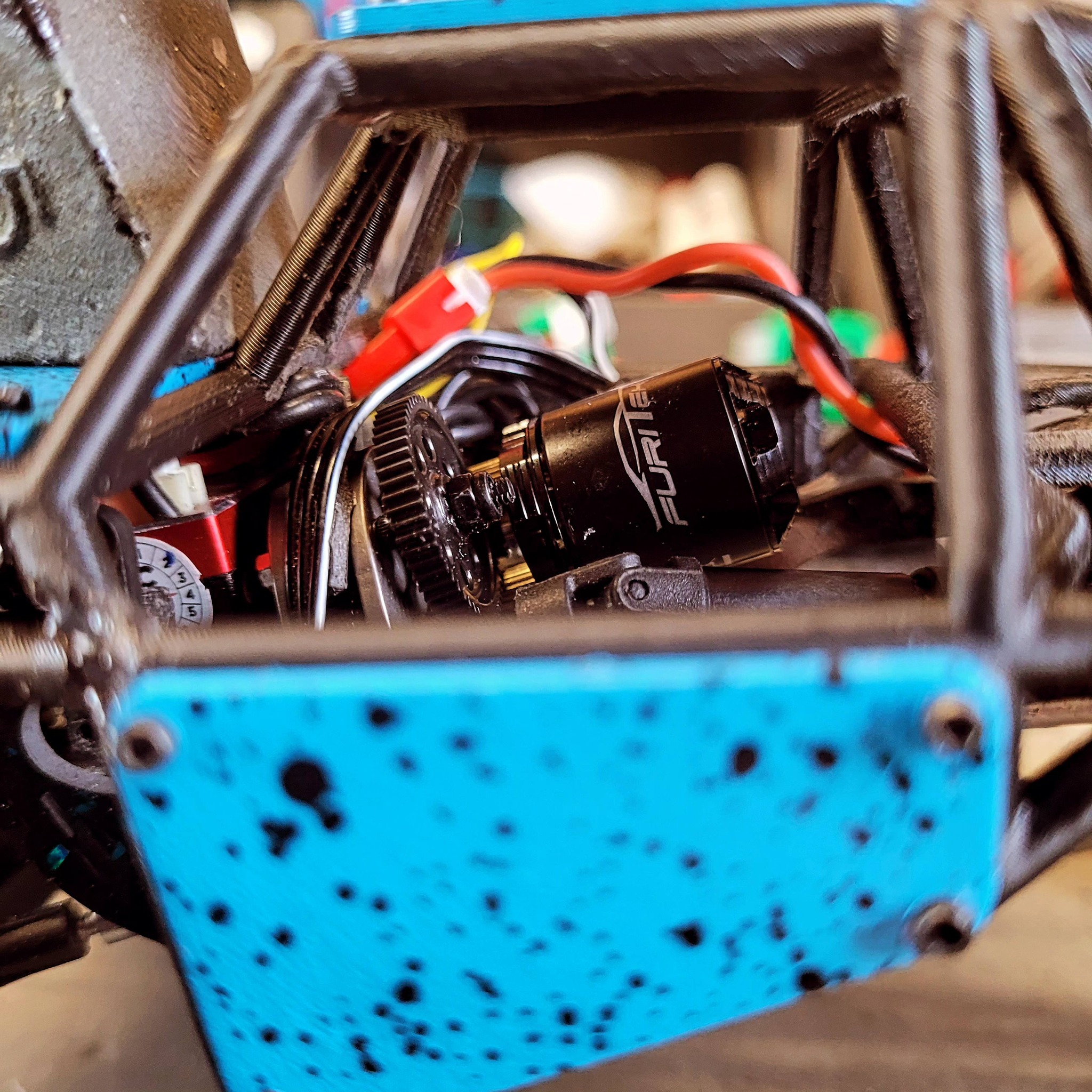Shortening front links on a micro crawler