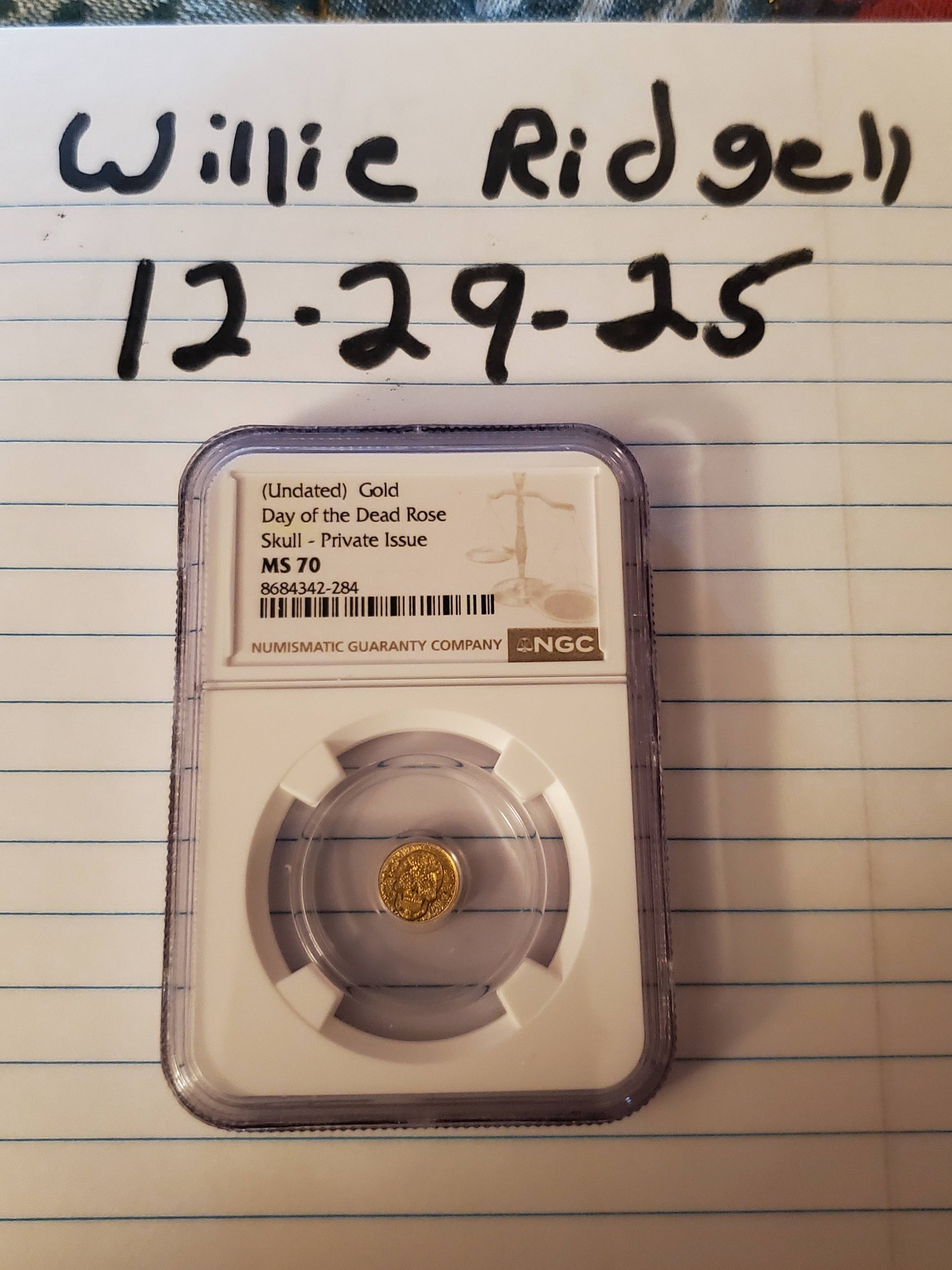 Day of the Dead gold coin auction winner
