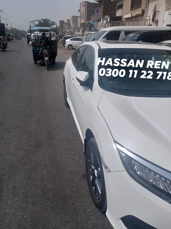 Hassan Online RENT A CAR Faisalabad