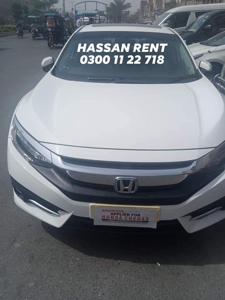 Hassan Online RENT A CAR Faisalabad