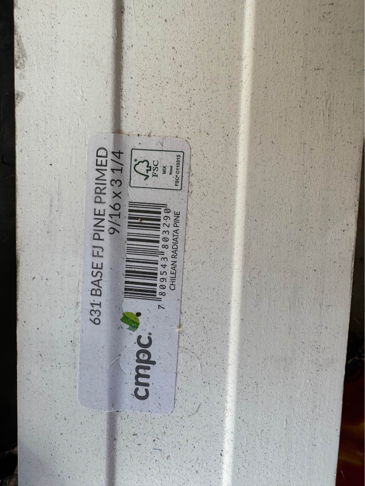 Various lengths baseboard (631), casing (366) and quarter round pieces ...