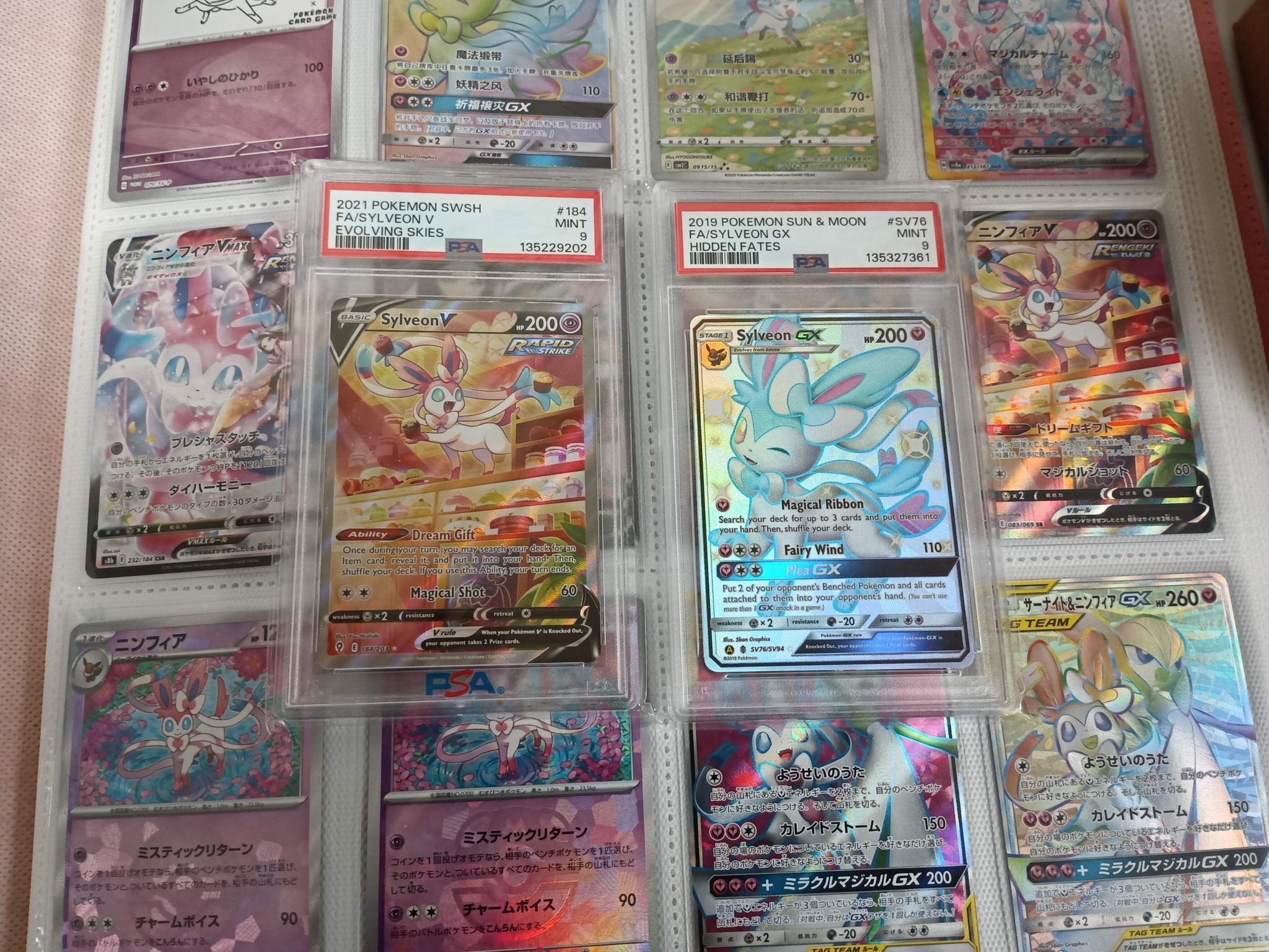 Adding Sylveon cards to collection with PSA 9 graded cards