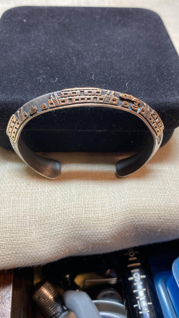 Just purchased this cuff. It is 14K and Sterling, Signed G. Reeves